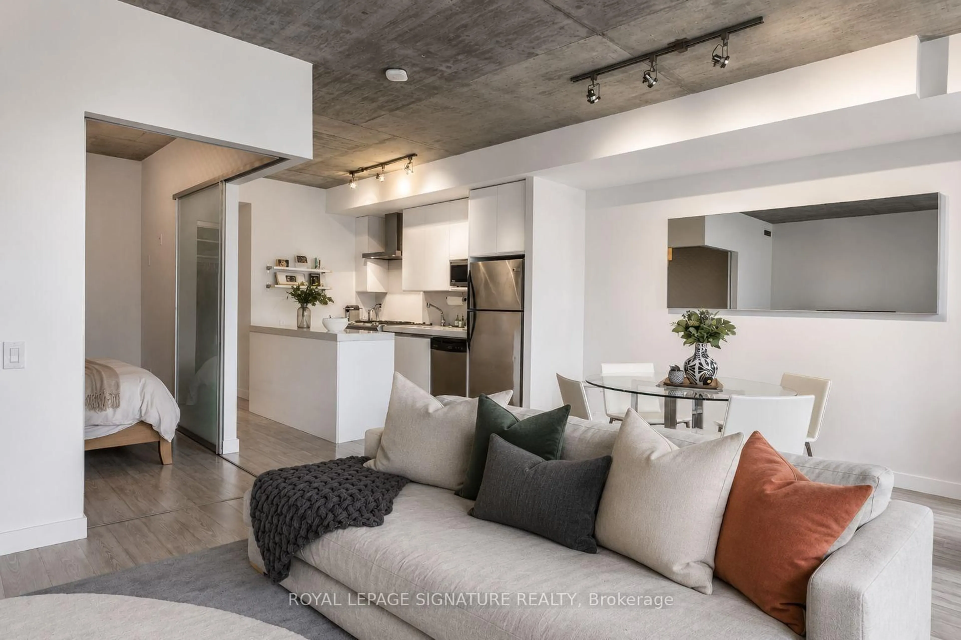 Open concept kitchen, cement floor for 75 Portland St #306, Toronto Ontario M5V 2M9