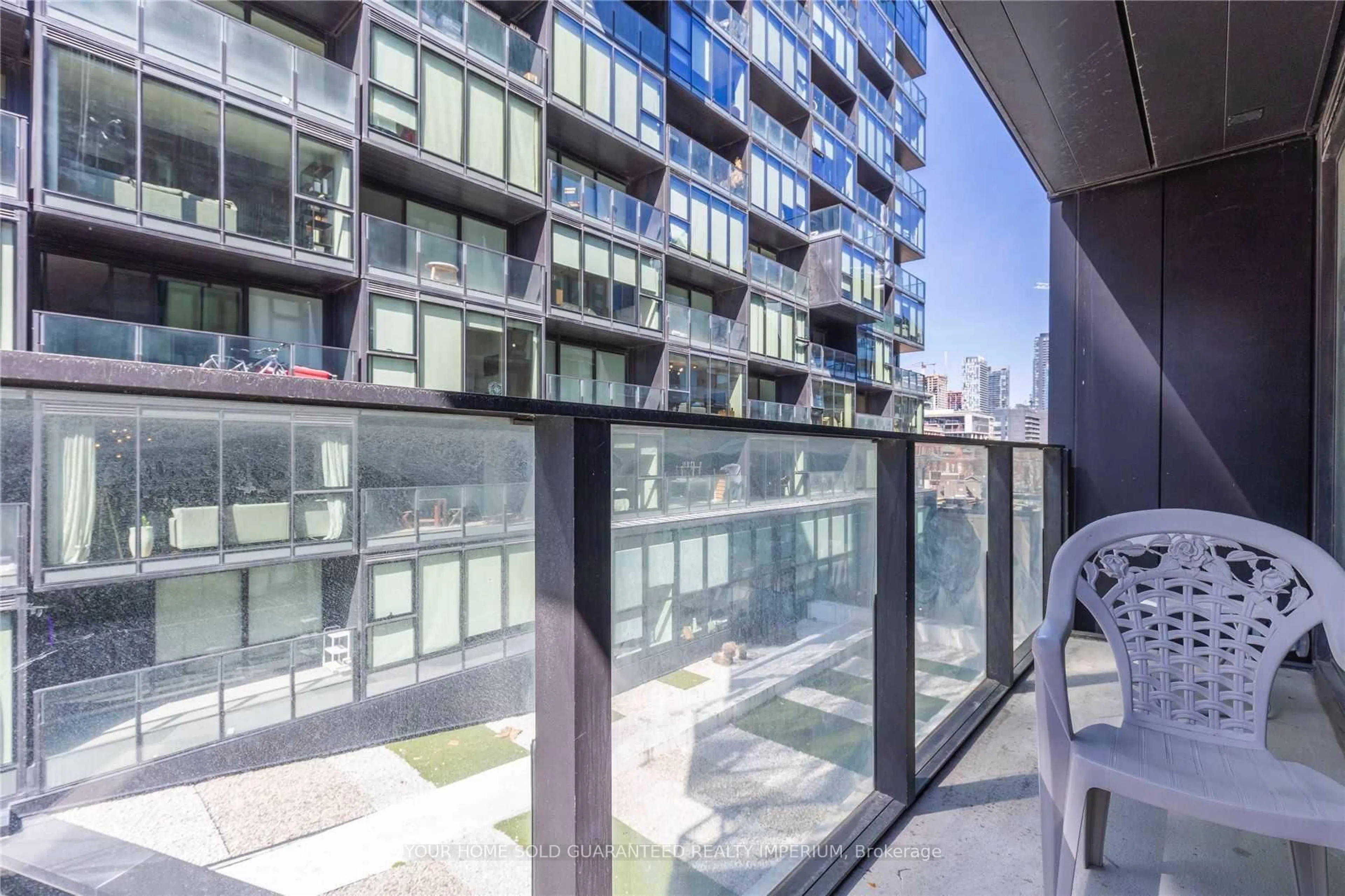 Balcony in the apartment, city buildings view from balcony for 38 Stewart St #405, Toronto Ontario M5V 1H6