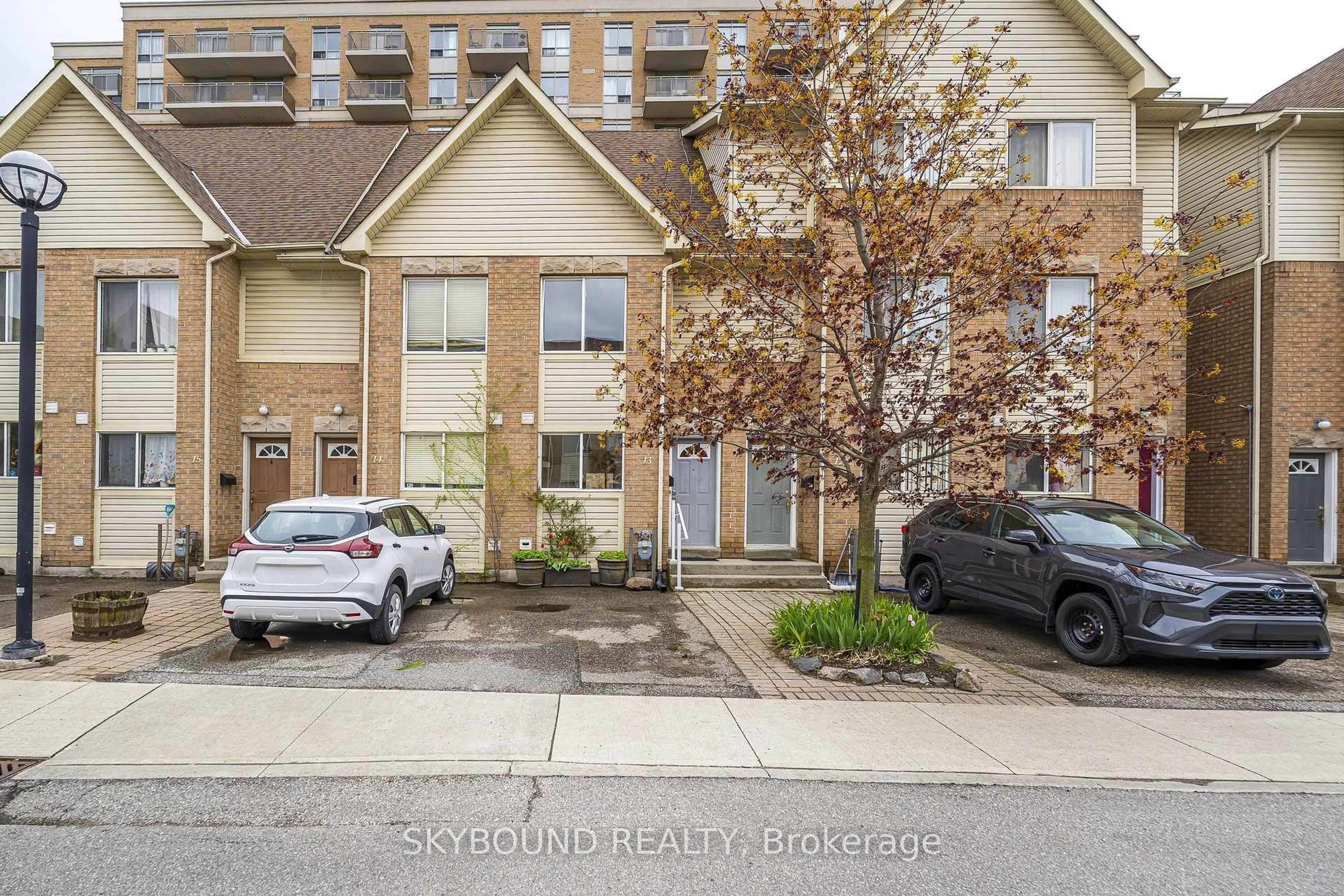 A pic from outside/outdoor area/front of a property/back of a property/a pic from drone, street for 25 Replin Rd ## 13, Toronto Ontario M6A 2M8