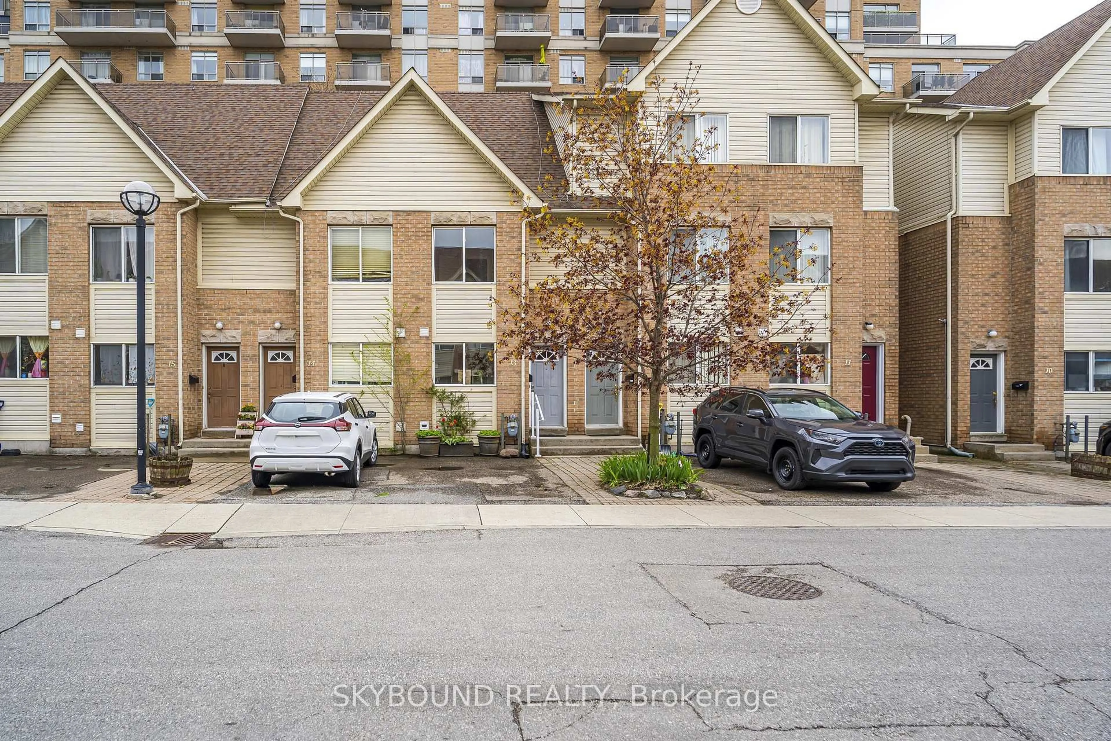 A pic from outside/outdoor area/front of a property/back of a property/a pic from drone, street for 25 Replin Rd ## 13, Toronto Ontario M6A 2M8