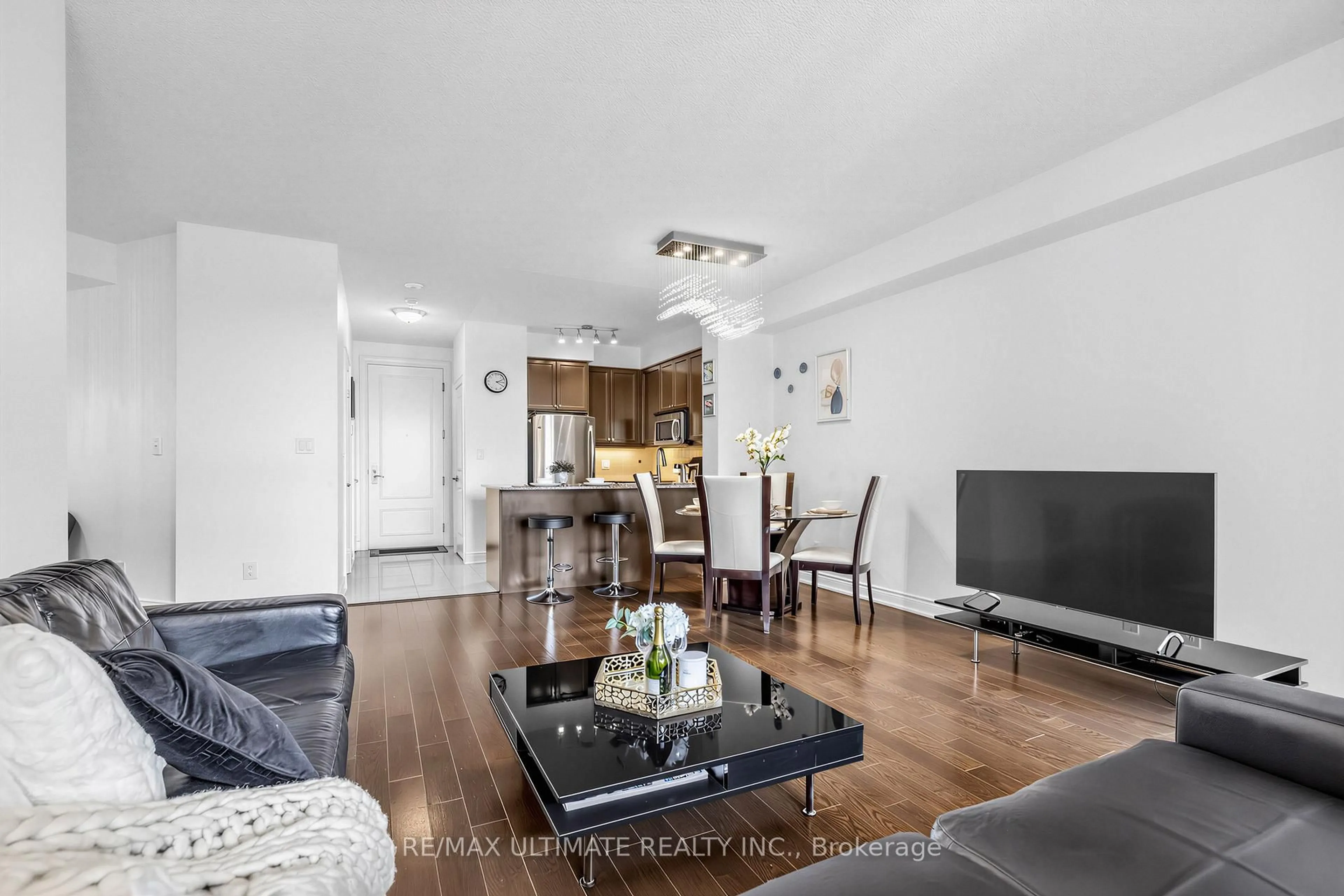 Living room with furniture, wood/laminate floor for 20 Bloorview Pl #1003, Toronto Ontario M2J 0A6