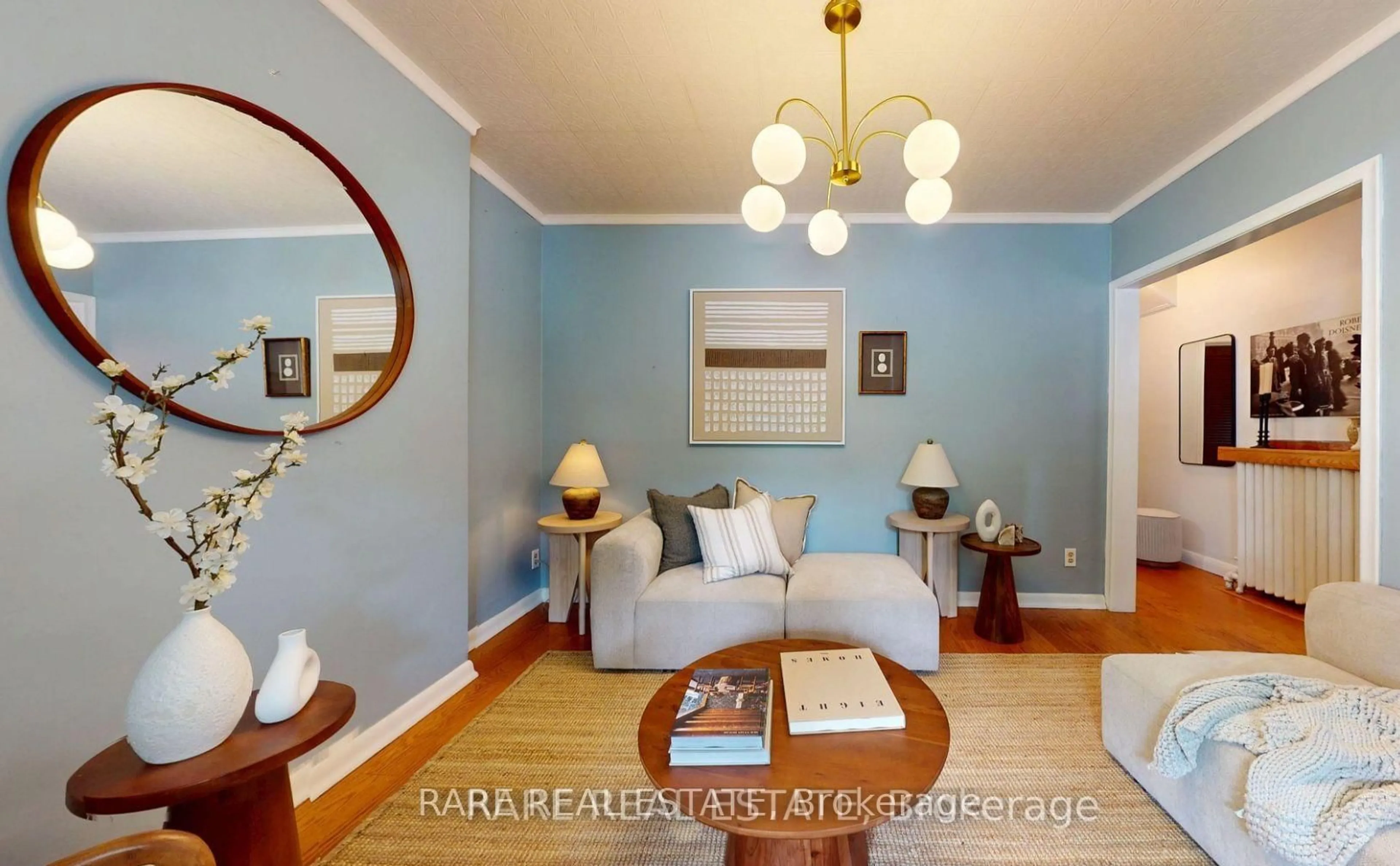 Living room with furniture, wood/laminate floor for 81 Bowood Ave, Toronto Ontario M4N 1Y3