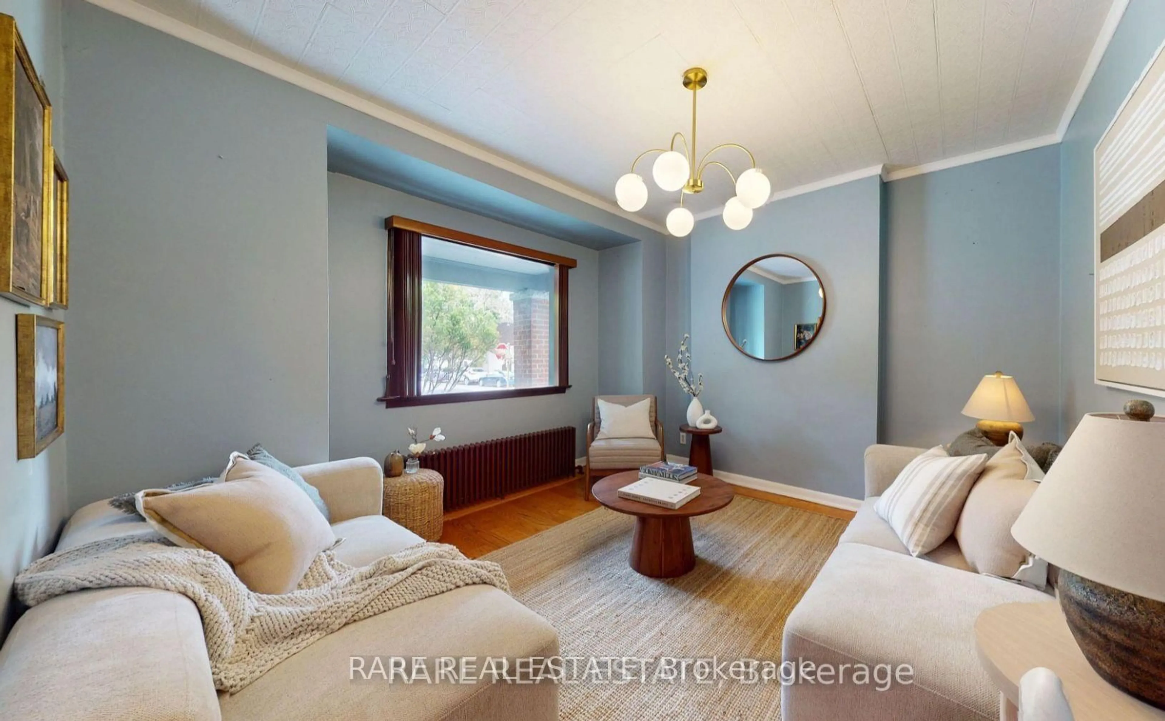 Living room with furniture, wood/laminate floor for 81 Bowood Ave, Toronto Ontario M4N 1Y3