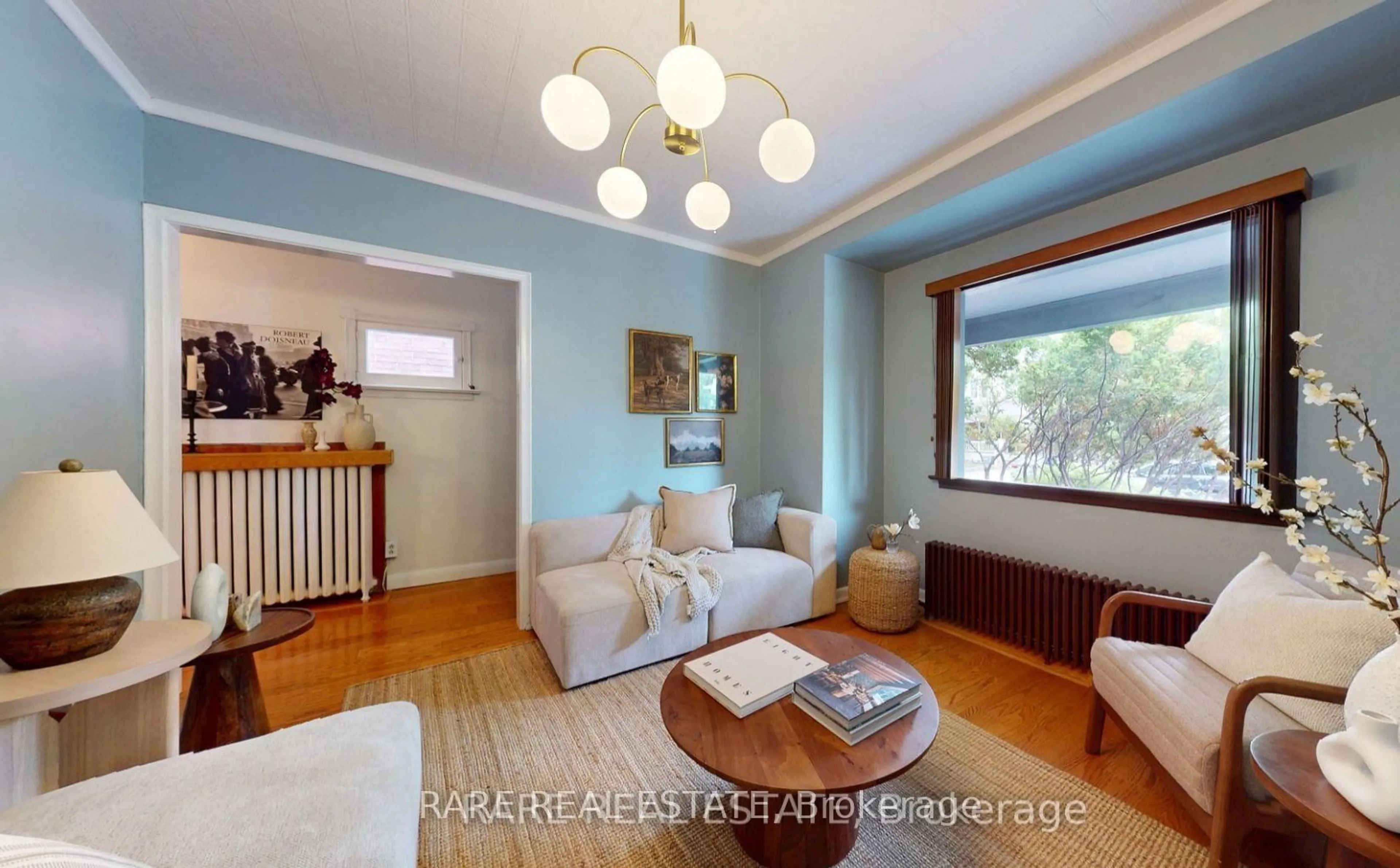 Living room with furniture, wood/laminate floor for 81 Bowood Ave, Toronto Ontario M4N 1Y3