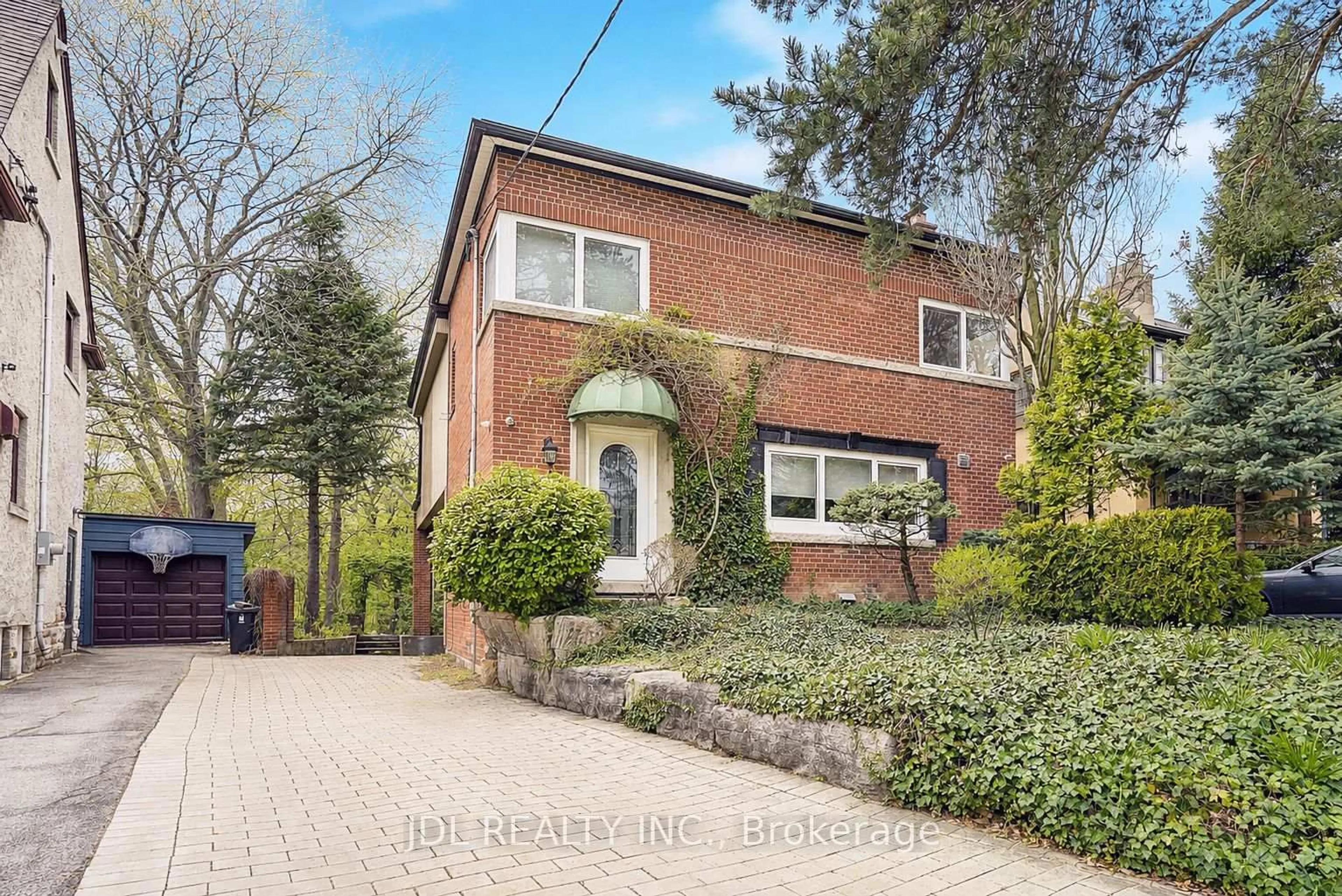 Home with brick exterior material, street for 6 Nesbitt Dr, Toronto Ontario M4W 2G3