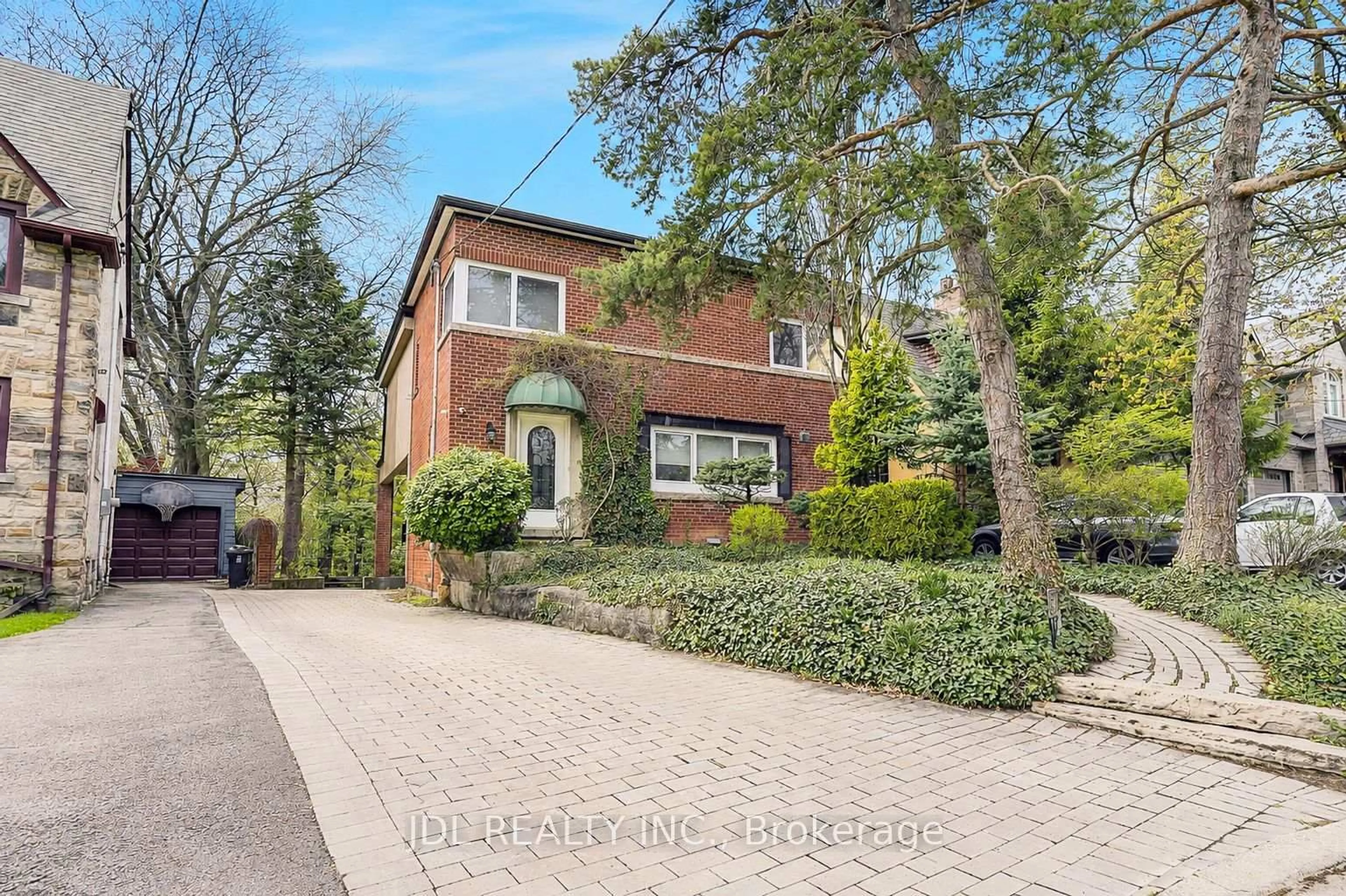 Home with brick exterior material, street for 6 Nesbitt Dr, Toronto Ontario M4W 2G3