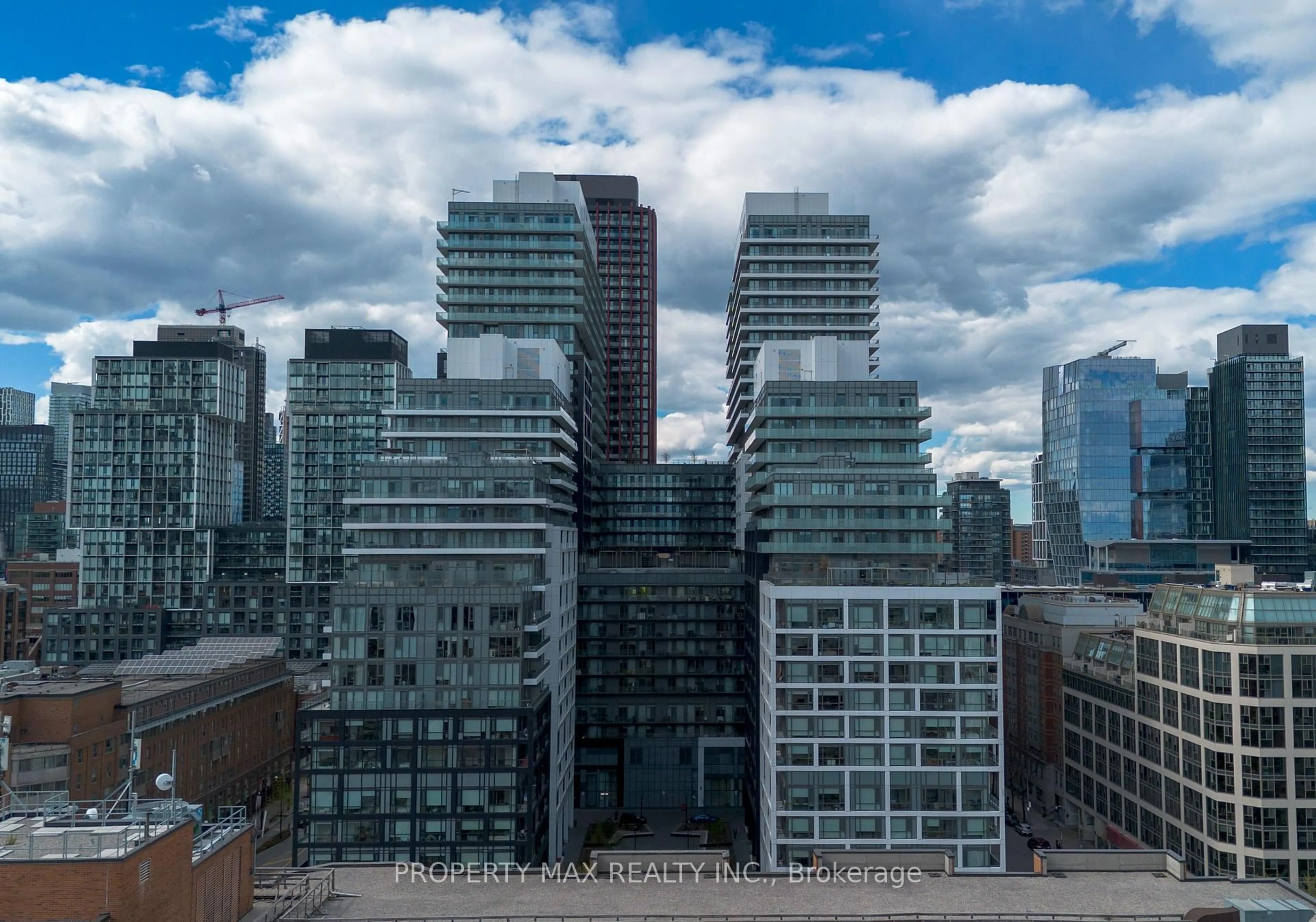A pic from outside/outdoor area/front of a property/back of a property/a pic from drone, city buildings view from balcony for 70 Princess St #403, Toronto Ontario M5A 0X6