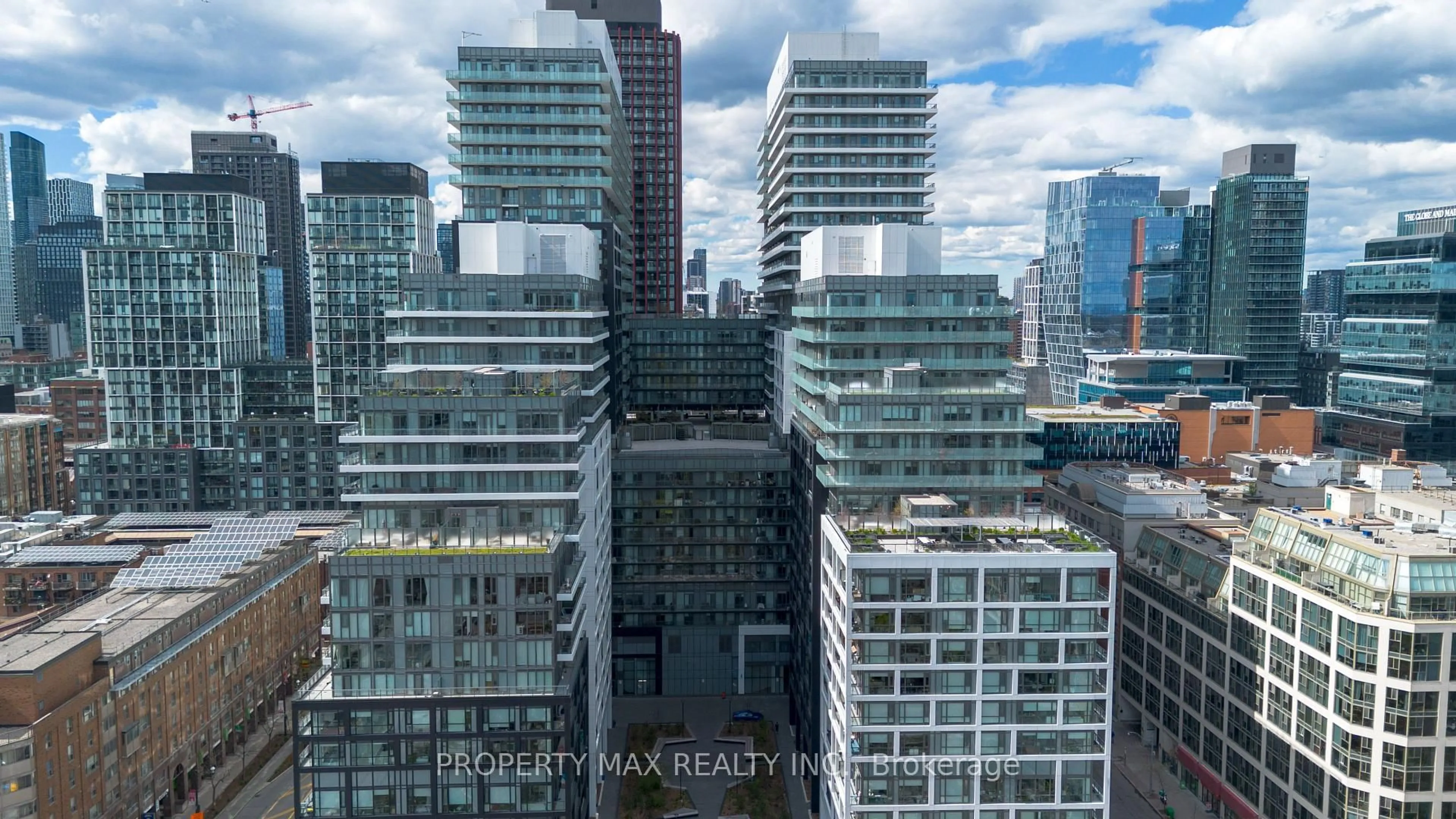 A pic from outside/outdoor area/front of a property/back of a property/a pic from drone, city buildings view from balcony for 70 Princess St #403, Toronto Ontario M5A 0X6