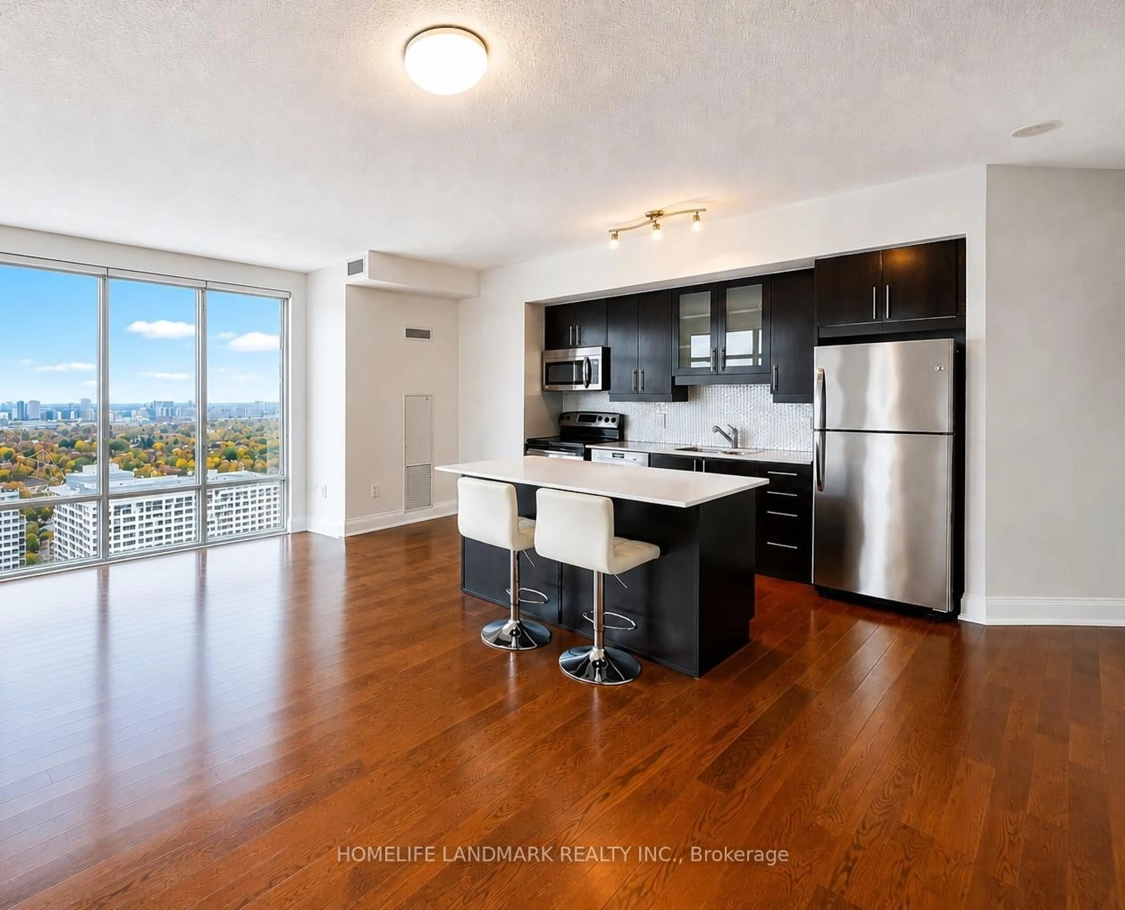 Open concept kitchen, wood/laminate floor for 2191 Yonge St #4211, Toronto Ontario M4S 3H8
