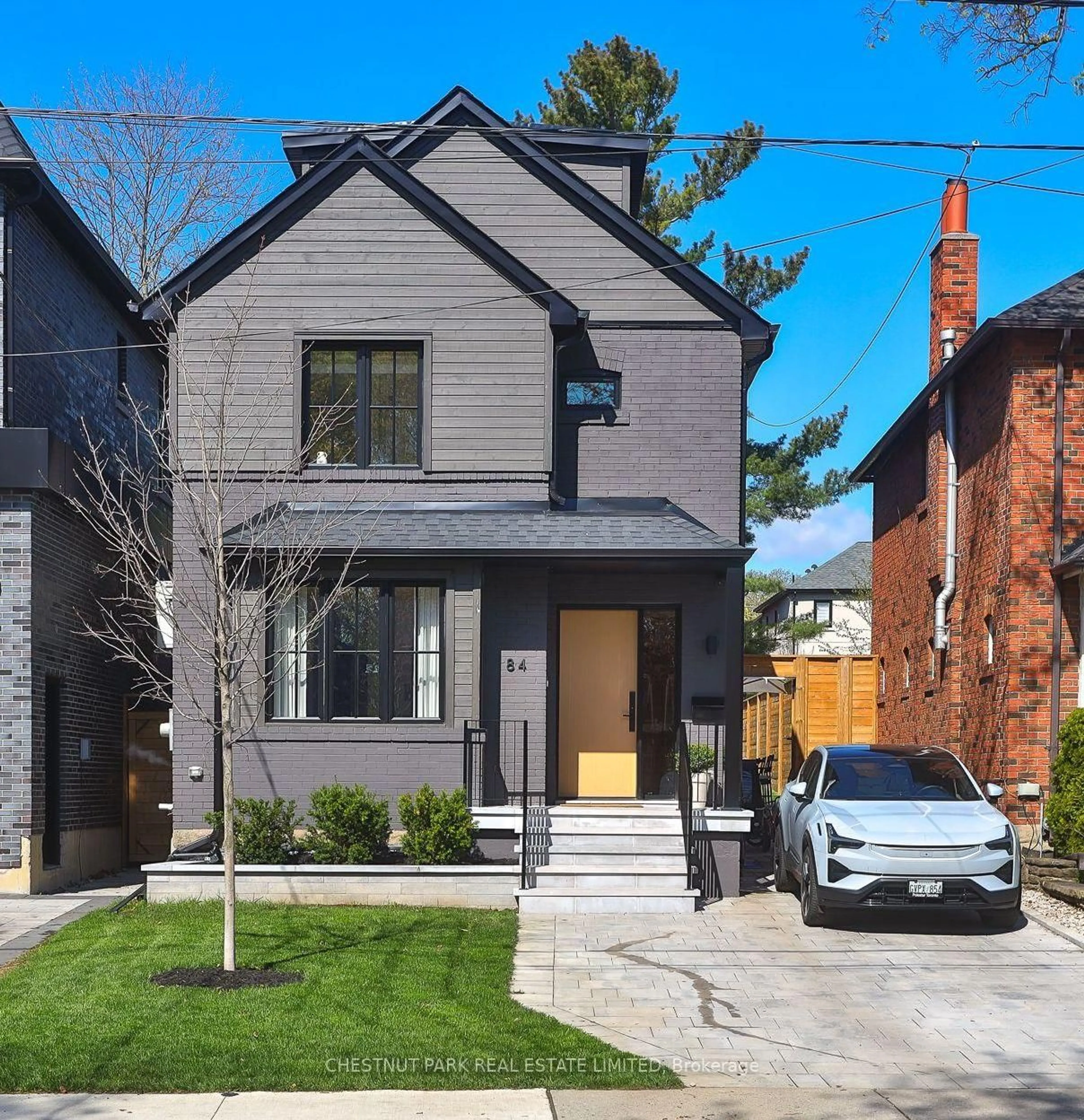 Home with brick exterior material, street for 84 Hanna Rd, Toronto Ontario M4G 3N3
