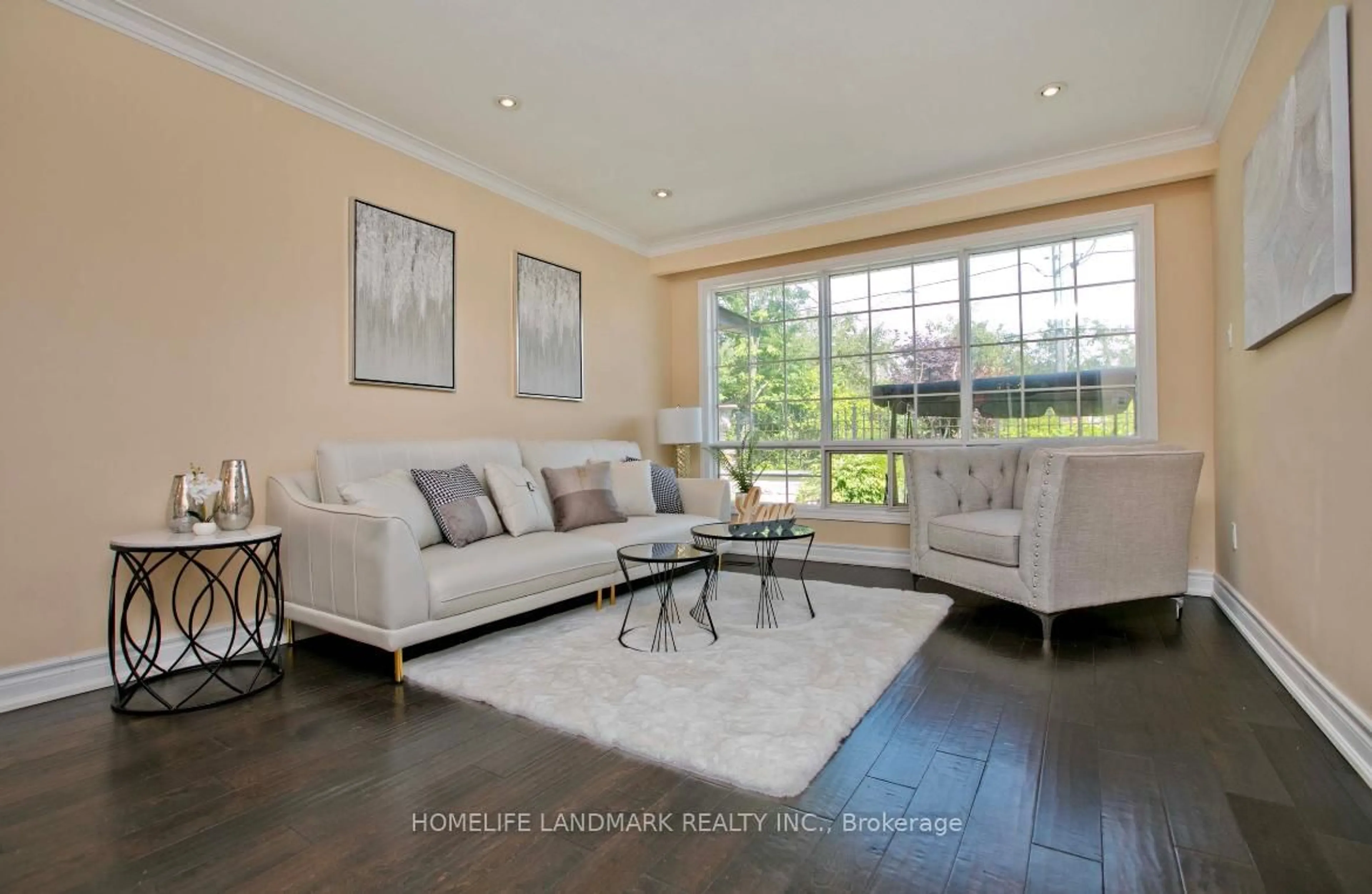Living room with furniture, wood/laminate floor for 157 Pleasant View Dr, Toronto Ontario M2J 3R3