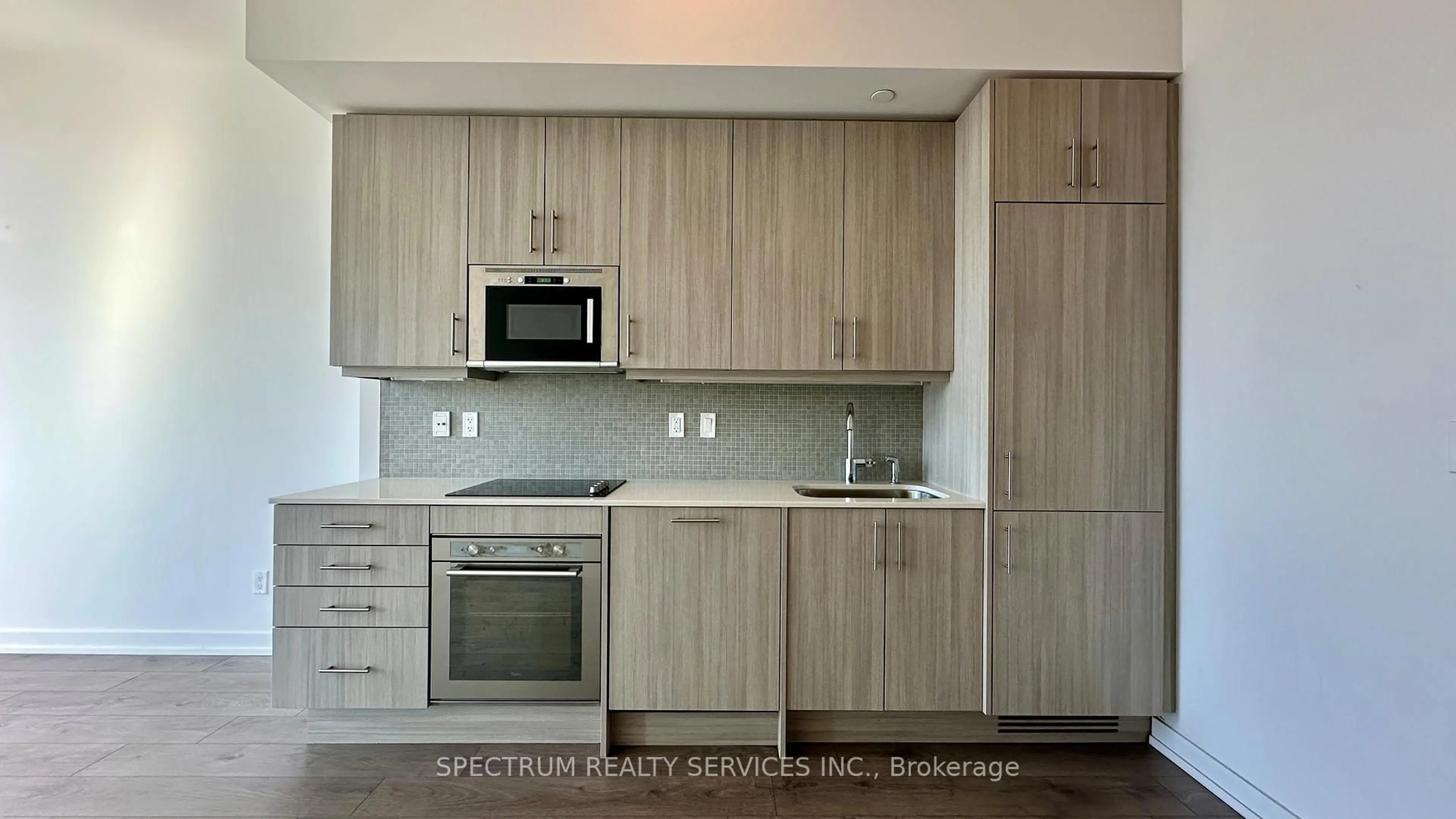Standard kitchen, wood/laminate floor for 297 College St #1008, Toronto Ontario M5T 0C2