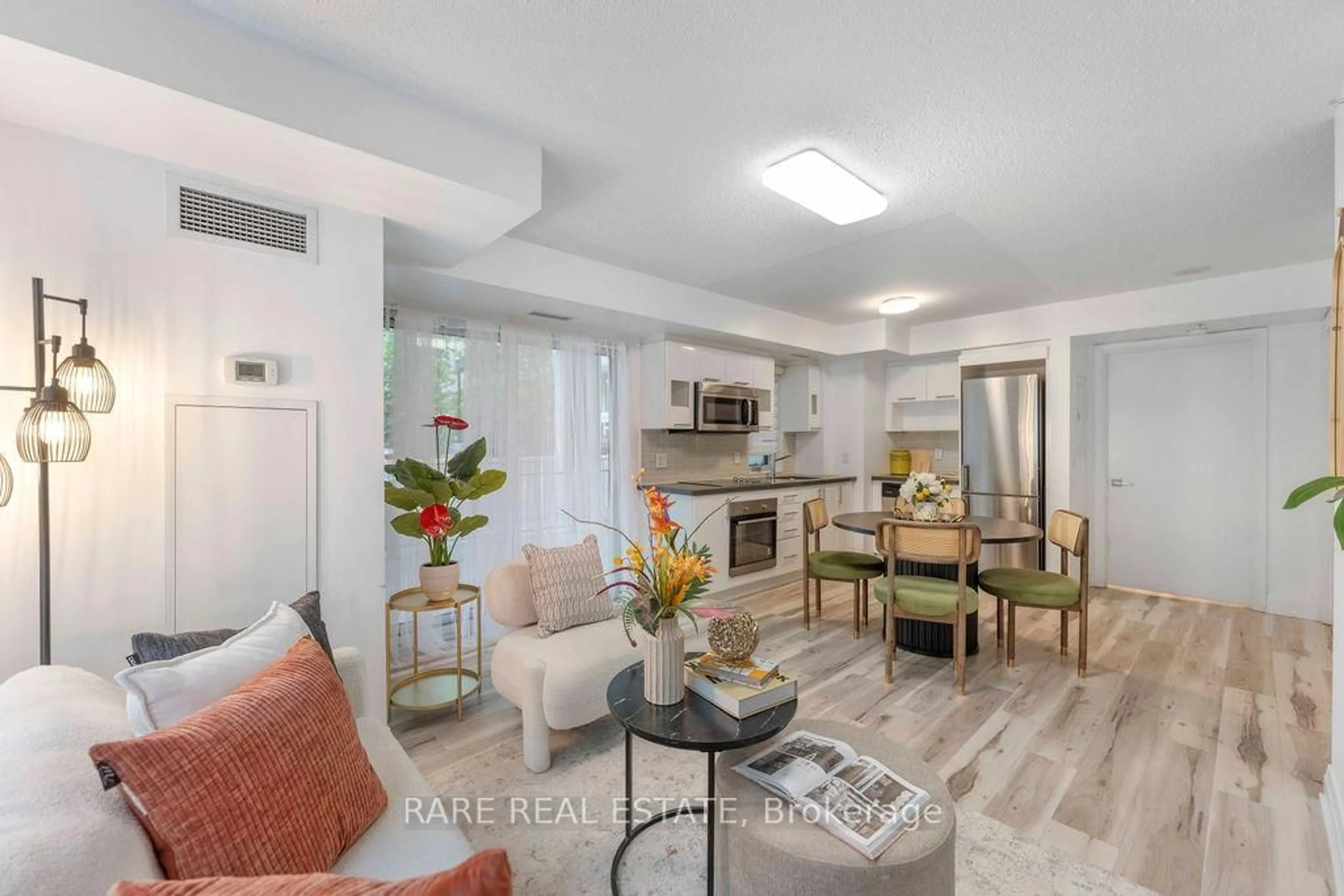 Living room with furniture, ceramic/tile floor for 555 WILSON Ave #E112, Toronto Ontario M3H 0C5