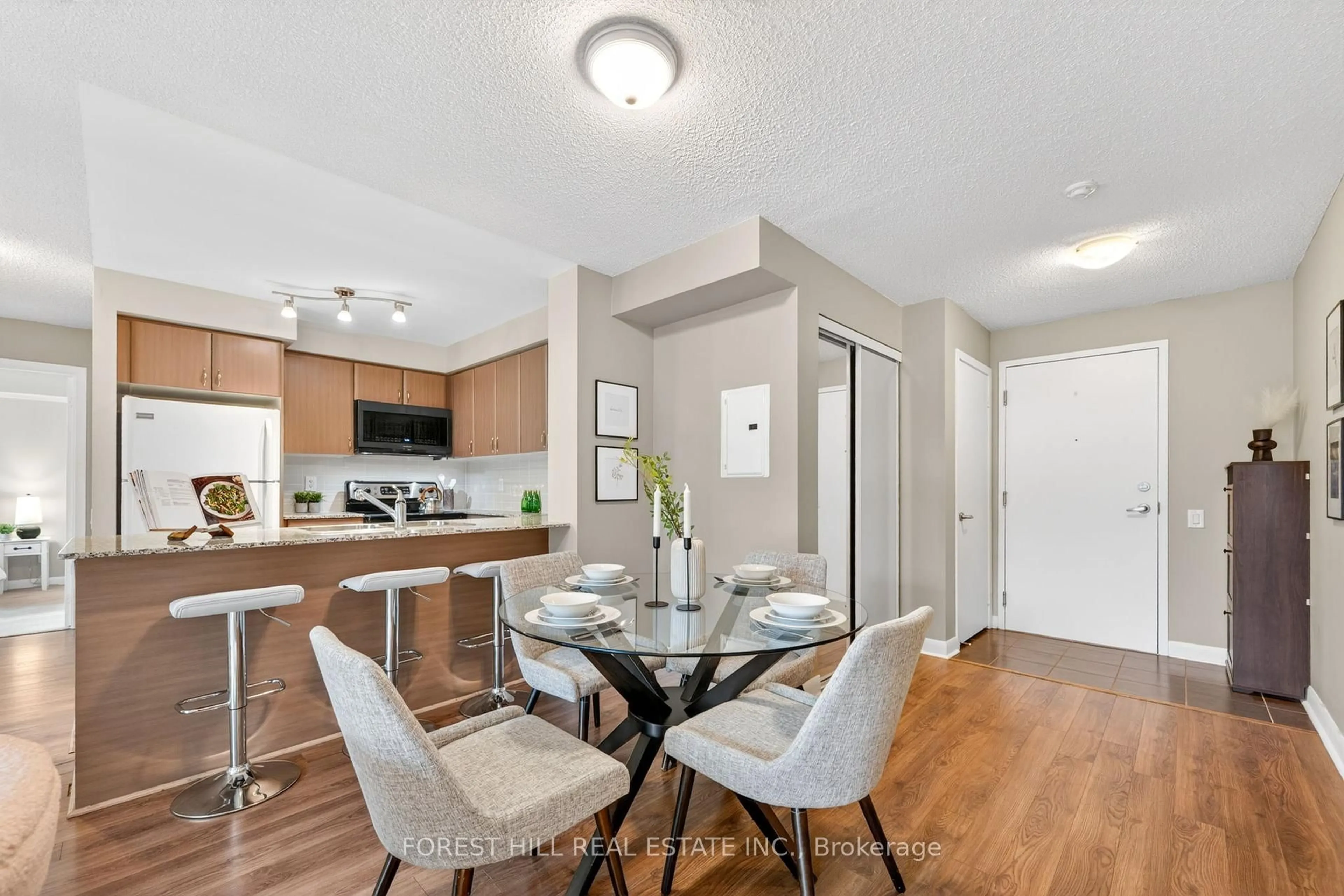 Open concept kitchen, wood/laminate floor for 525 Wilson Ave #655, Toronto Ontario M3H 0A7