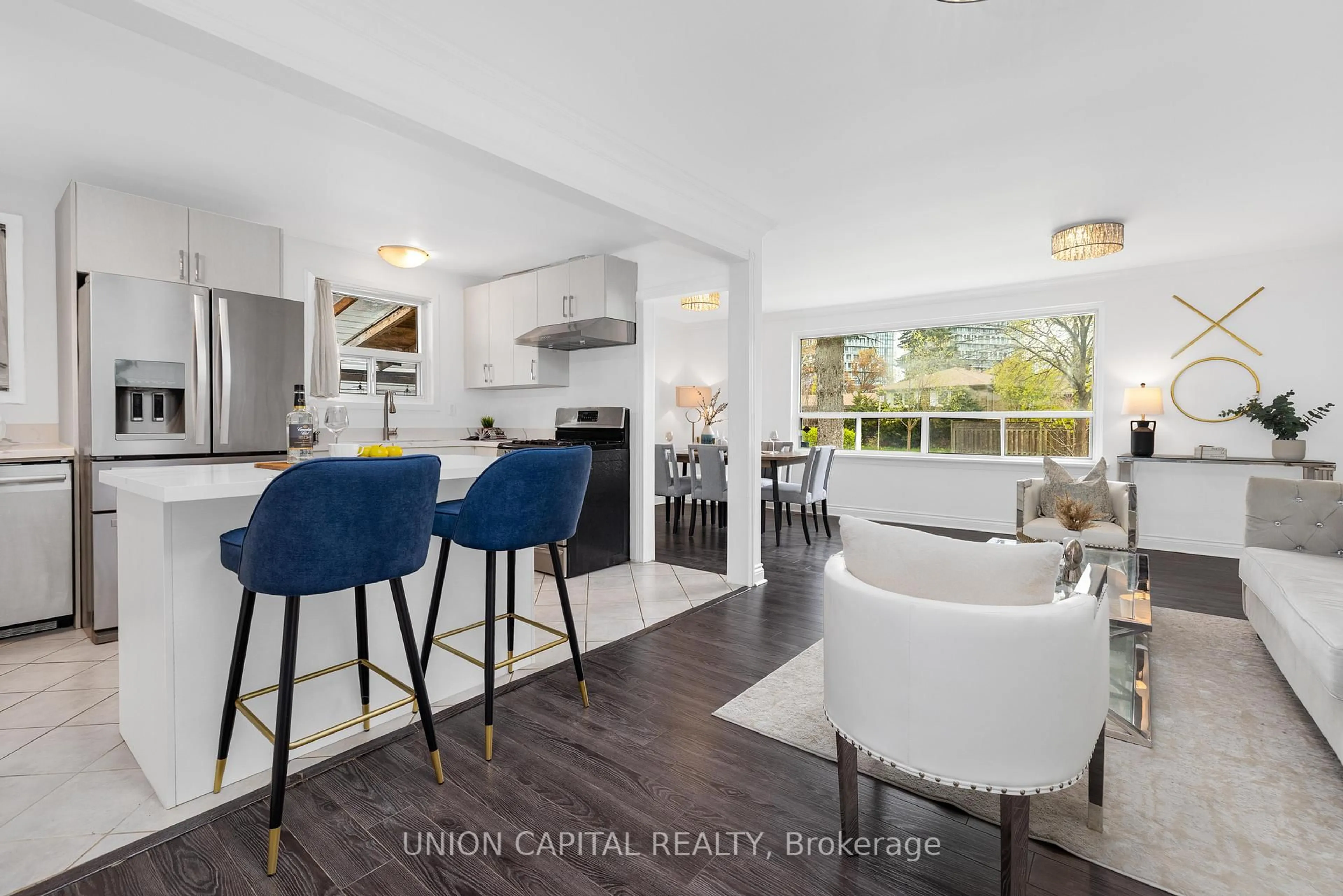 Open concept kitchen, wood/laminate floor for 34 Lisburn Cres, Toronto Ontario M2J 2Z5