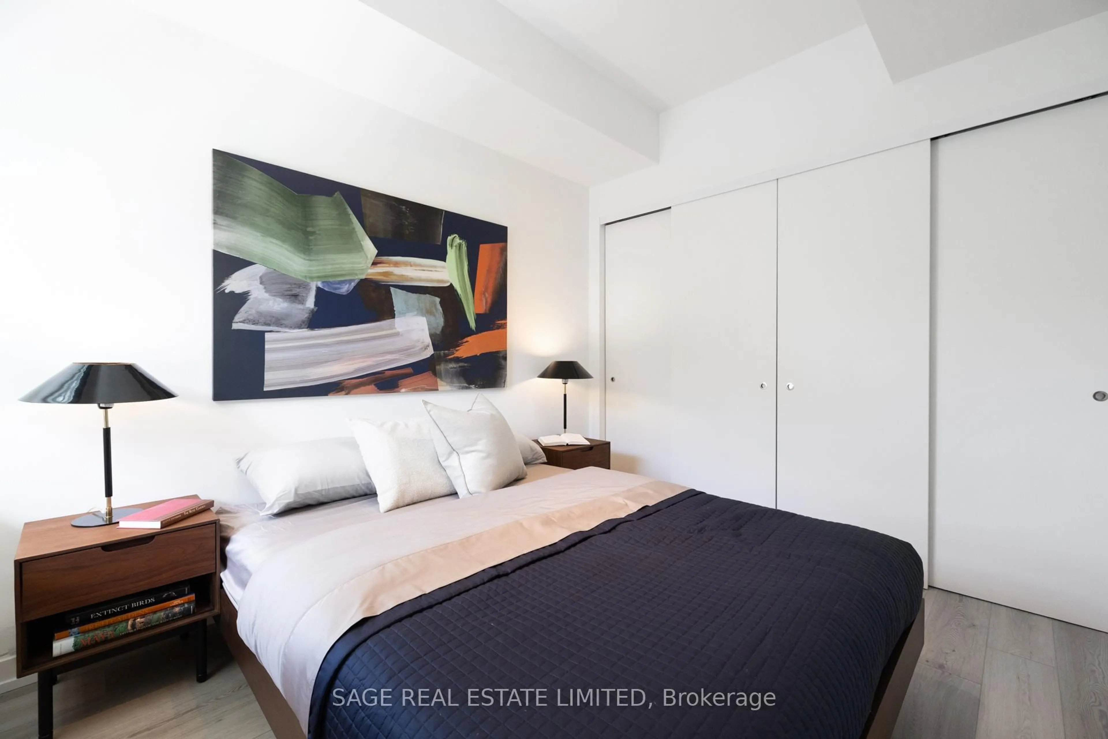 Bedroom with bed, wood/laminate floor for 863 St Clair Ave #206, Toronto Ontario M6C 1C4