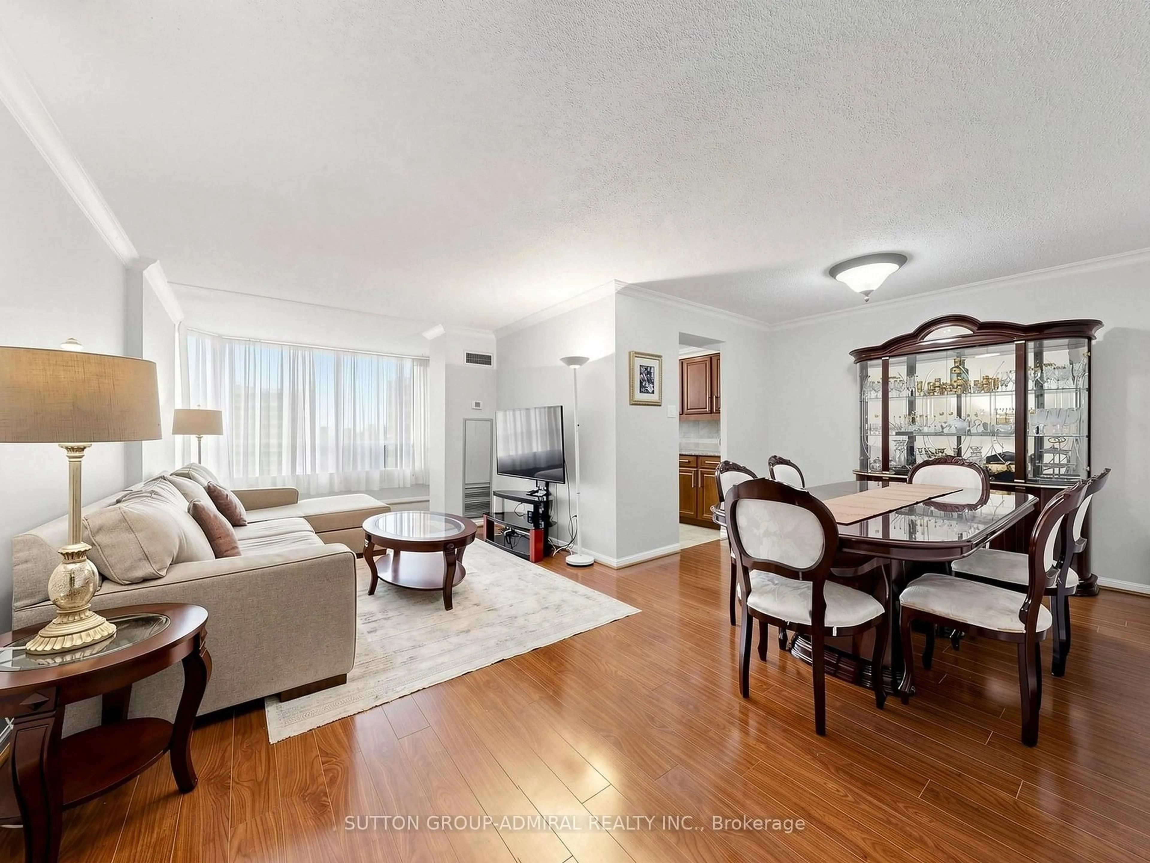 Living room with furniture, wood/laminate floor for 1131 Steeles Ave #1504, Toronto Ontario M2R 3W8