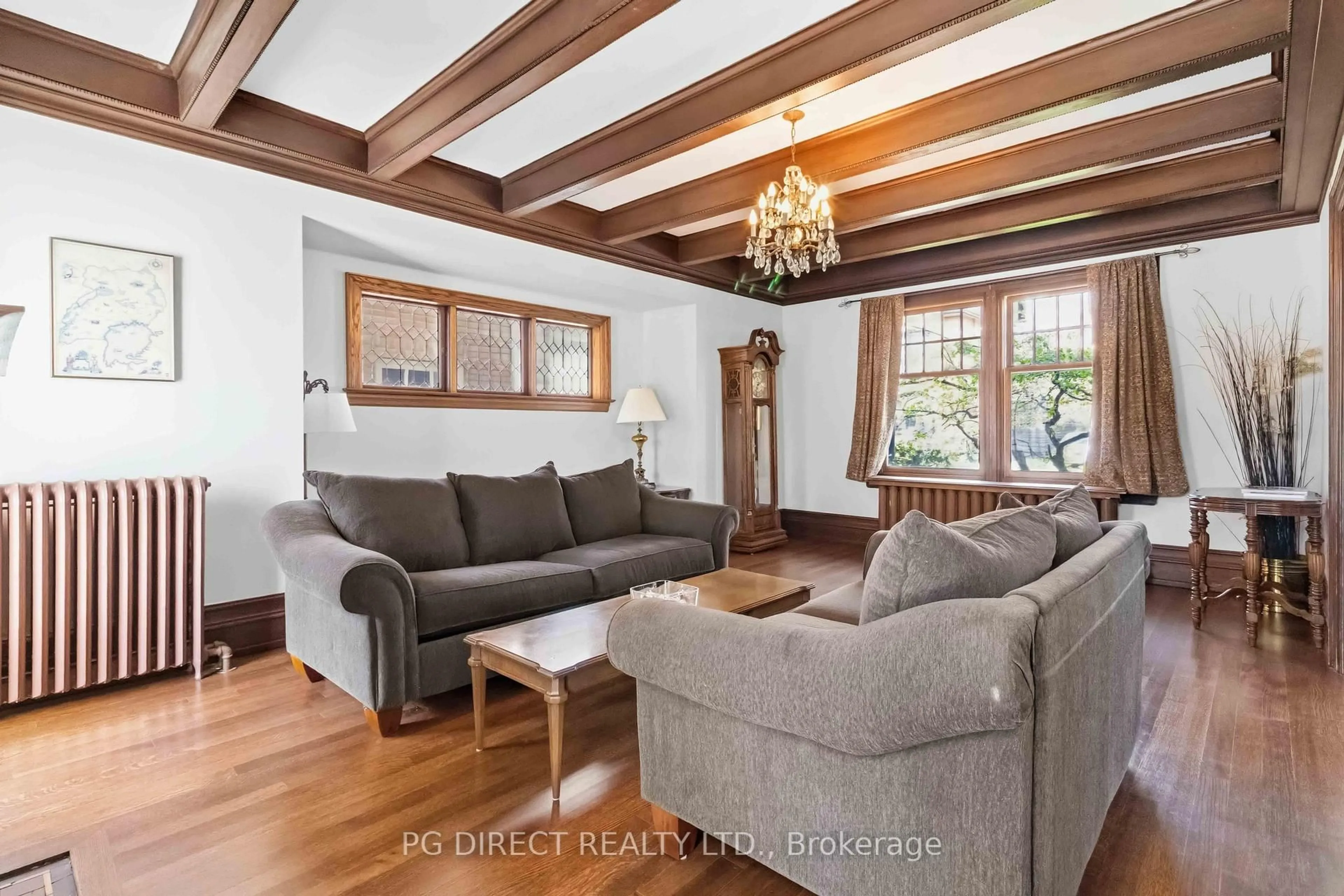 Living room with furniture, wood/laminate floor for 41 Nanton Ave, Toronto Ontario M4W 2Y8