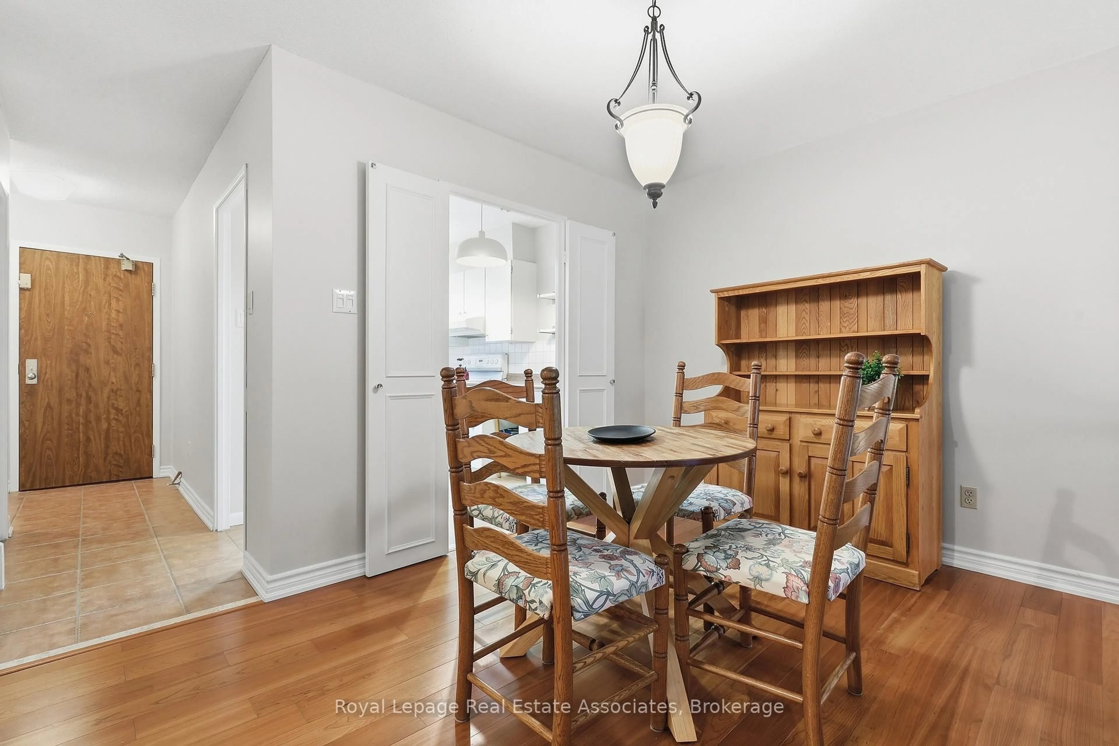 Dining room, wood/laminate floor for 40 Sylvan Valley Way #116, Toronto Ontario M5M 4M3