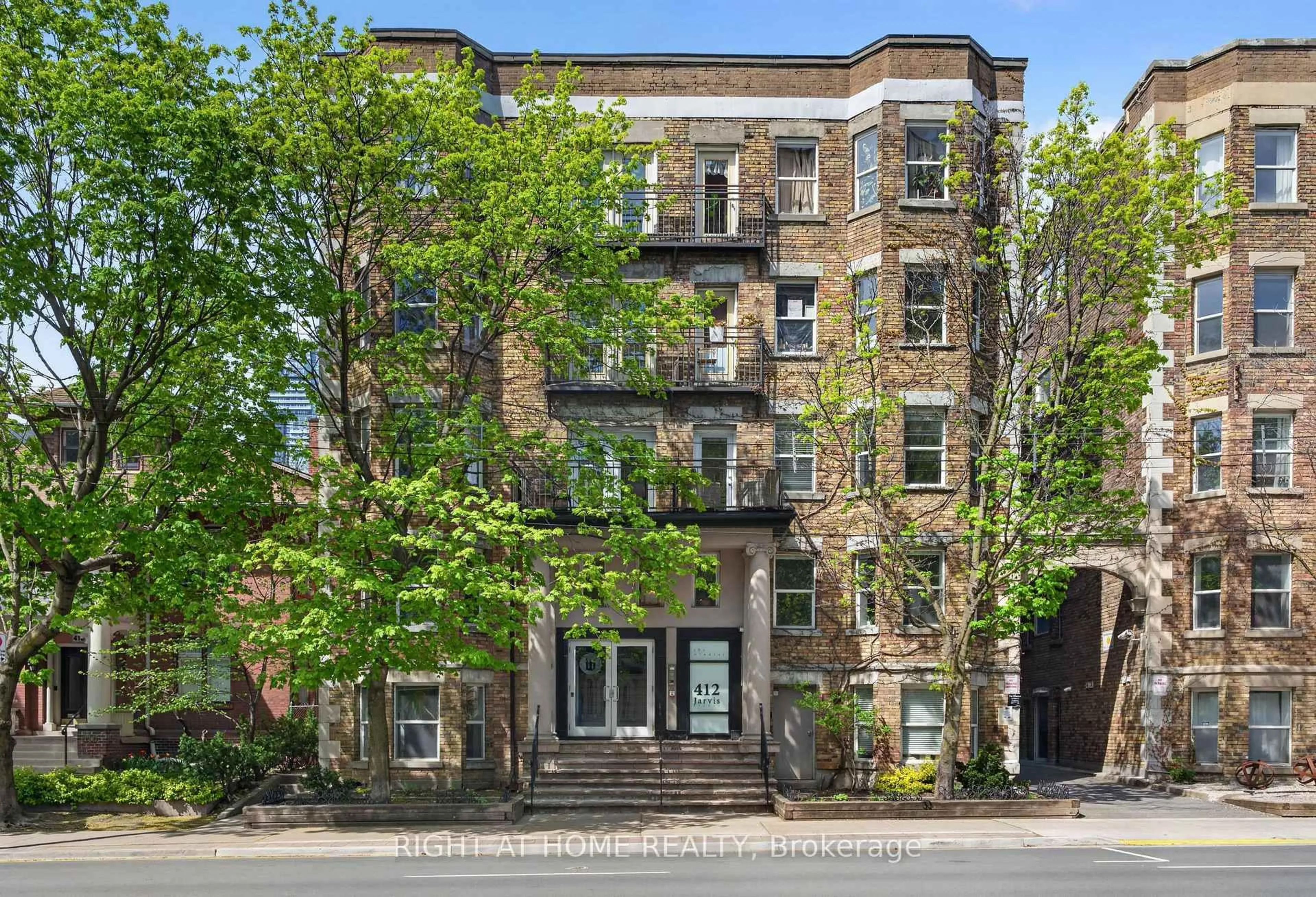 Home with brick exterior material, building for 412 Jarvis St #301, Toronto Ontario M4Y 2G6