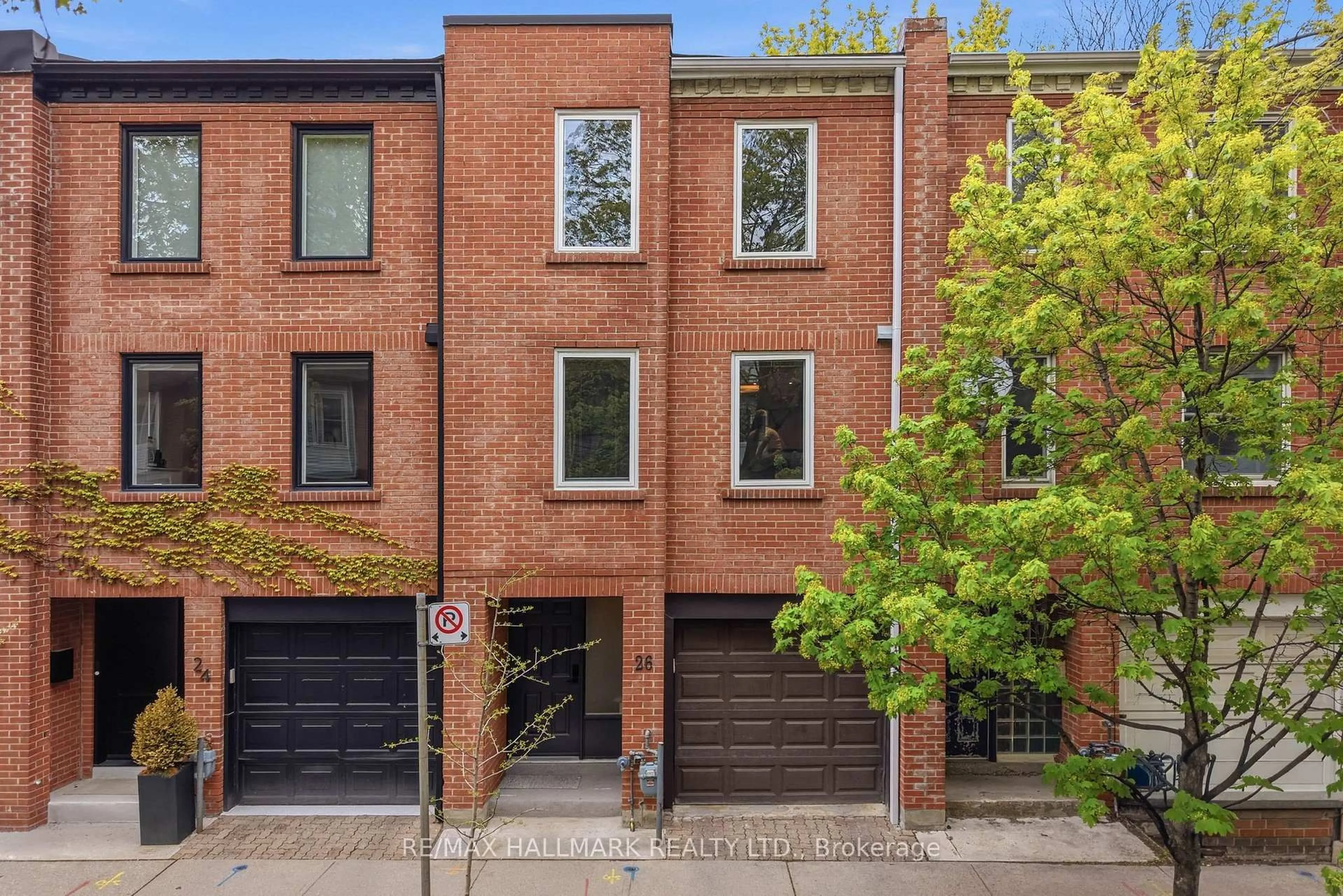 Home with brick exterior material, street for 26 Longboat Ave, Toronto Ontario M5A 4E2