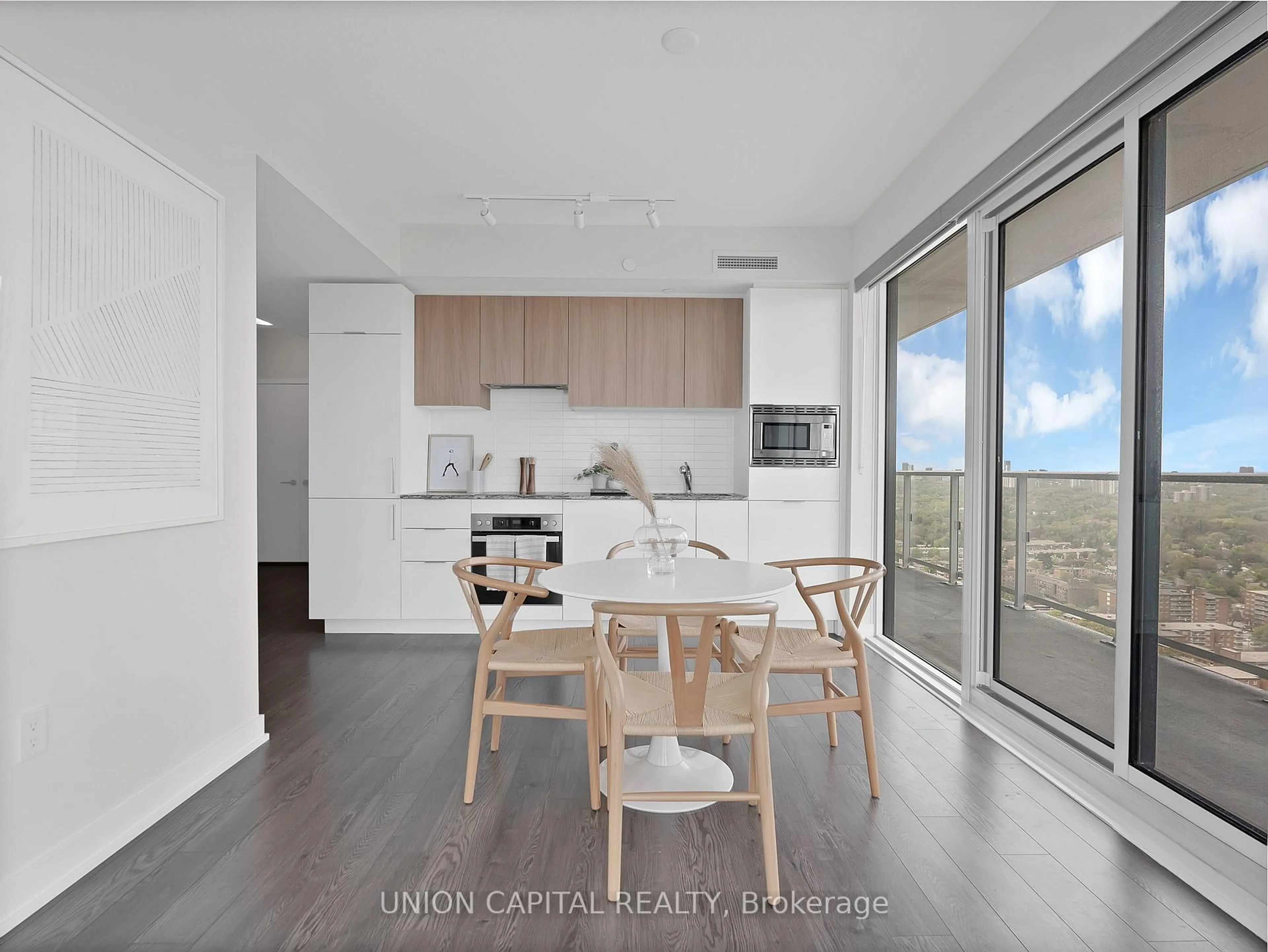 Open concept kitchen, wood/laminate floor for 50 O'Neill Rd #2802, Toronto Ontario M3C 0R1