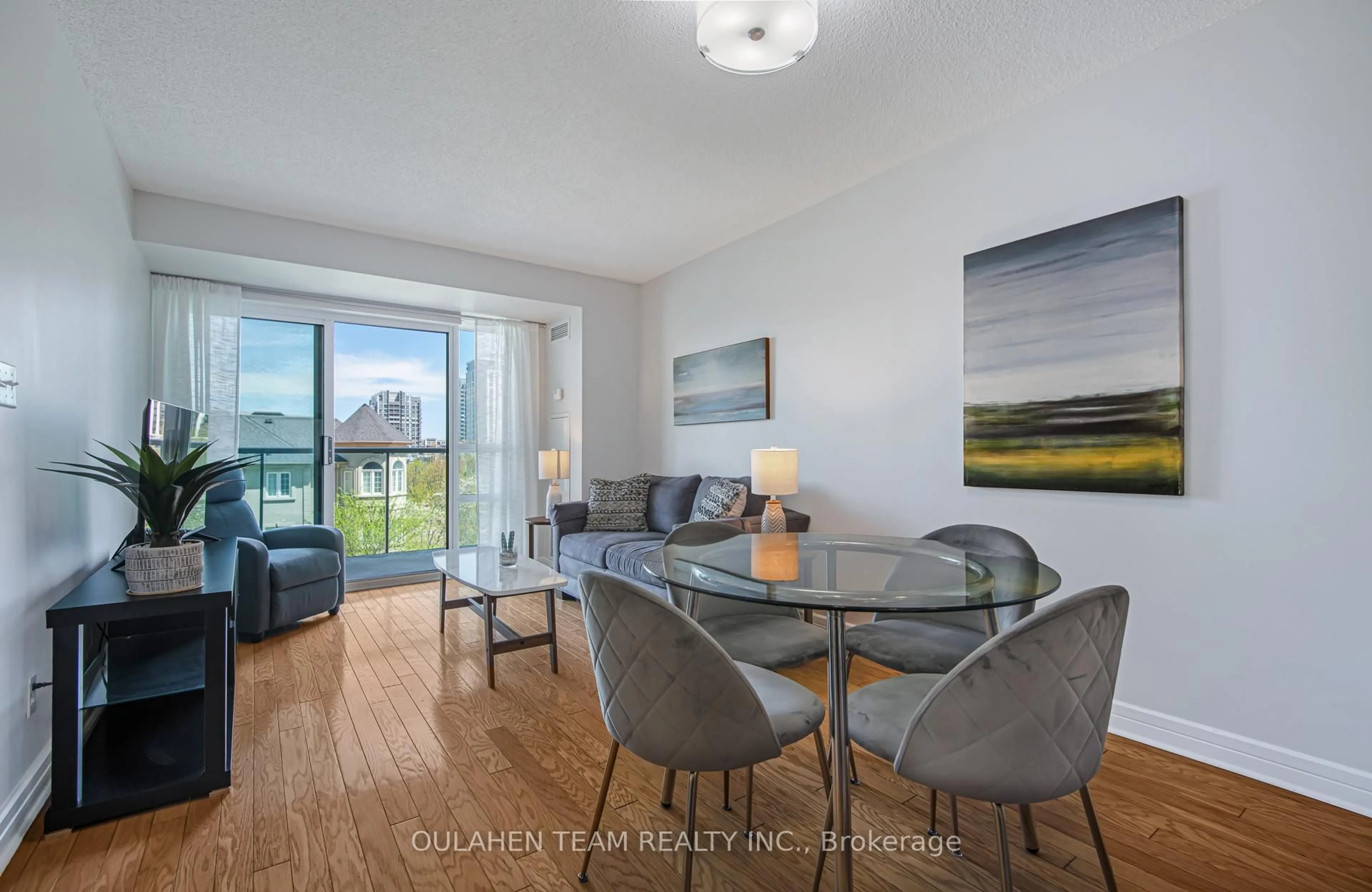 Living room with furniture, wood/laminate floor for 16 Harrison Garden Blvd #309, Toronto Ontario M2N 7J6