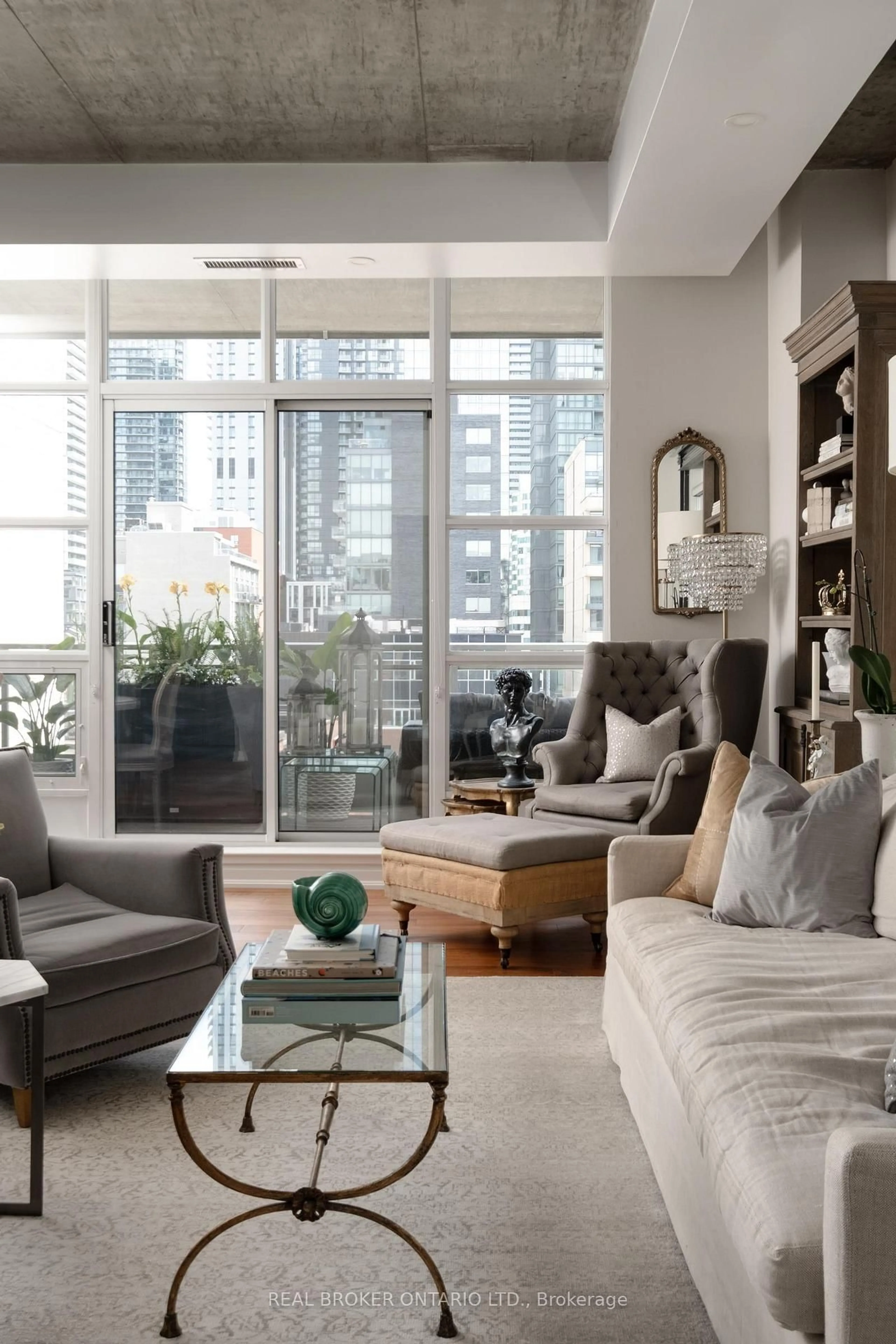 Living room with furniture, cement floor for 23 Brant St #803, Toronto Ontario M5V 2L5