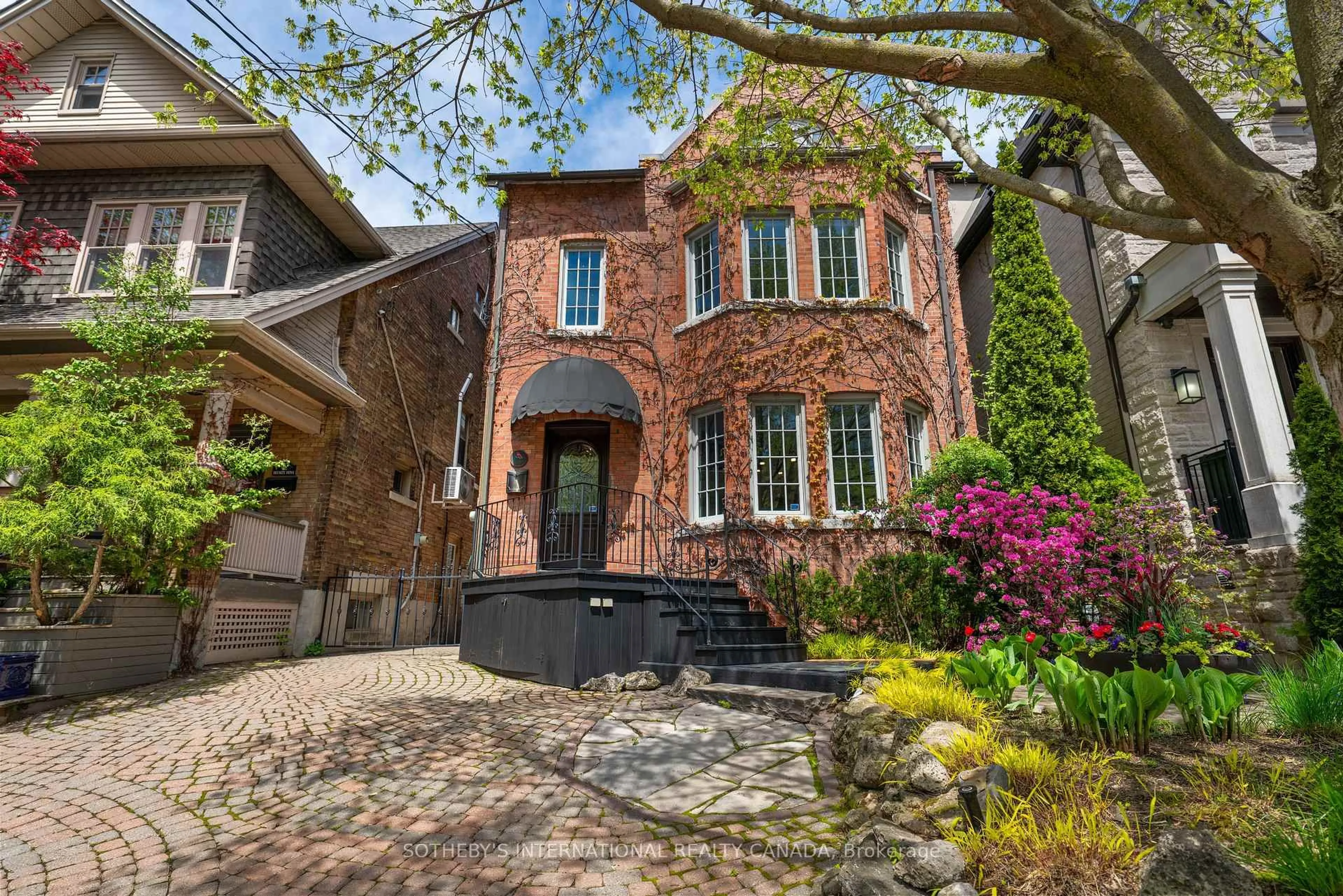 Home with brick exterior material, street for 34 Belsize Dr, Toronto Ontario M4S 1L4