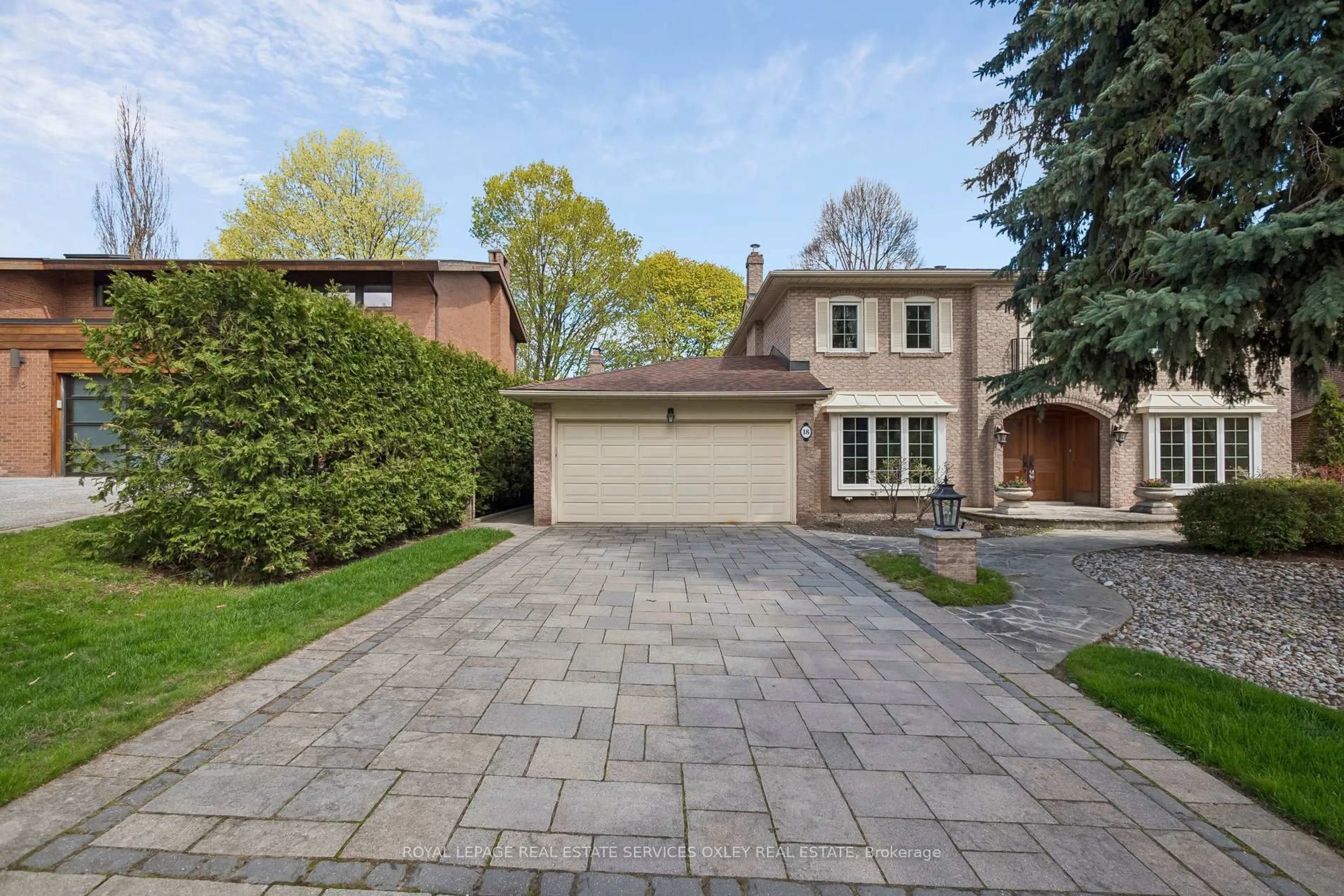 Home with brick exterior material, street for 18 Swansdown Dr, Toronto Ontario M2L 2N1