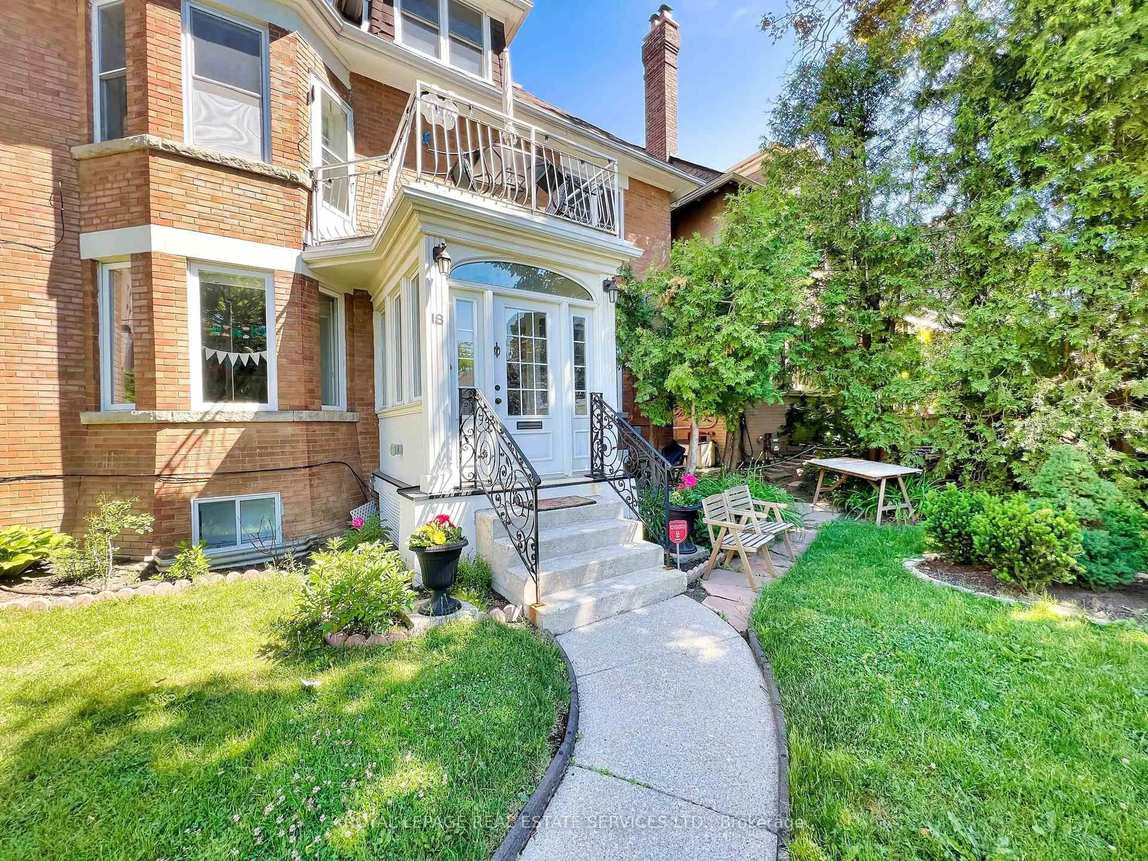 Home with brick exterior material, street for 18 Shorncliffe Ave, Toronto Ontario M4V 1T1