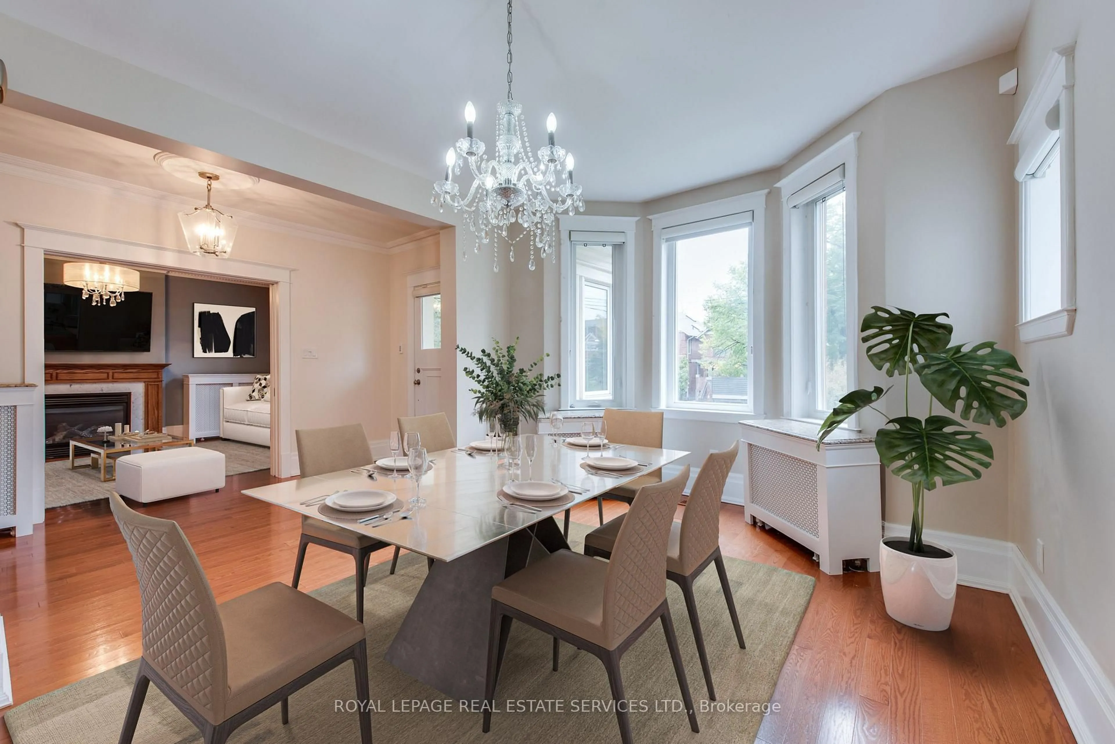 Dining room, wood/laminate floor for 18 Shorncliffe Ave, Toronto Ontario M4V 1T1