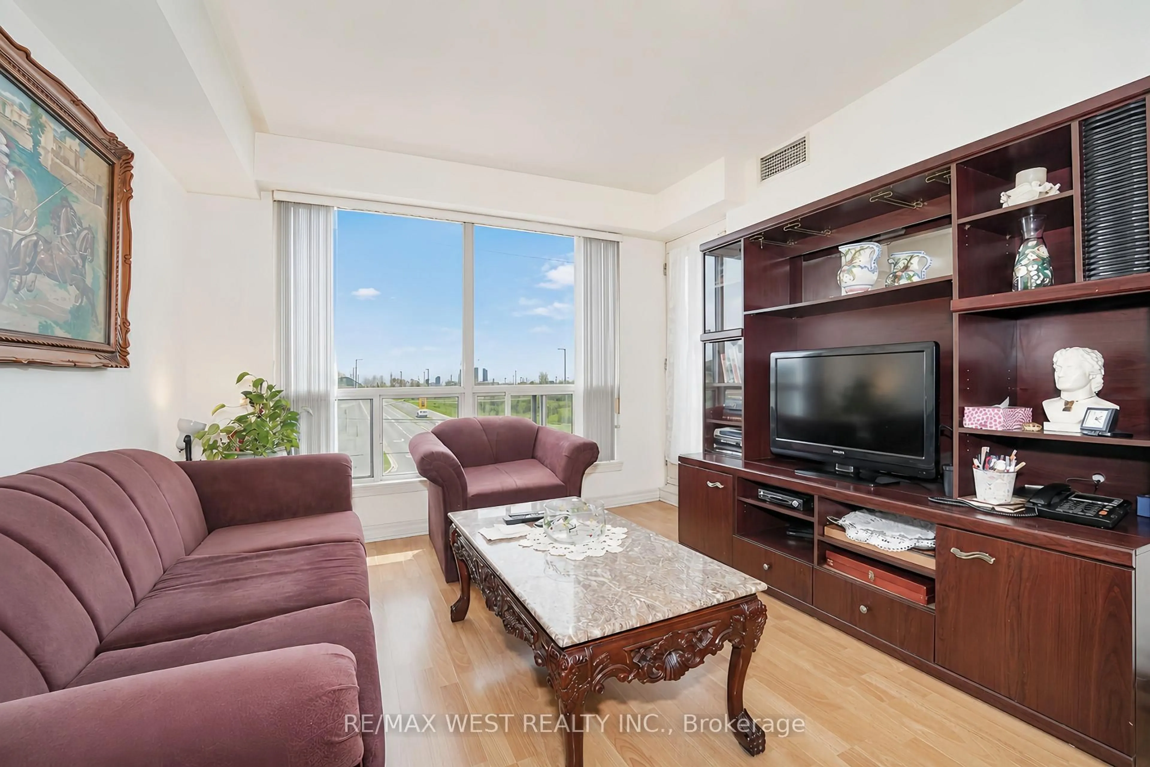 Living room with furniture, unknown for 1030 Sheppard Ave #208, Toronto Ontario M3H 6C1