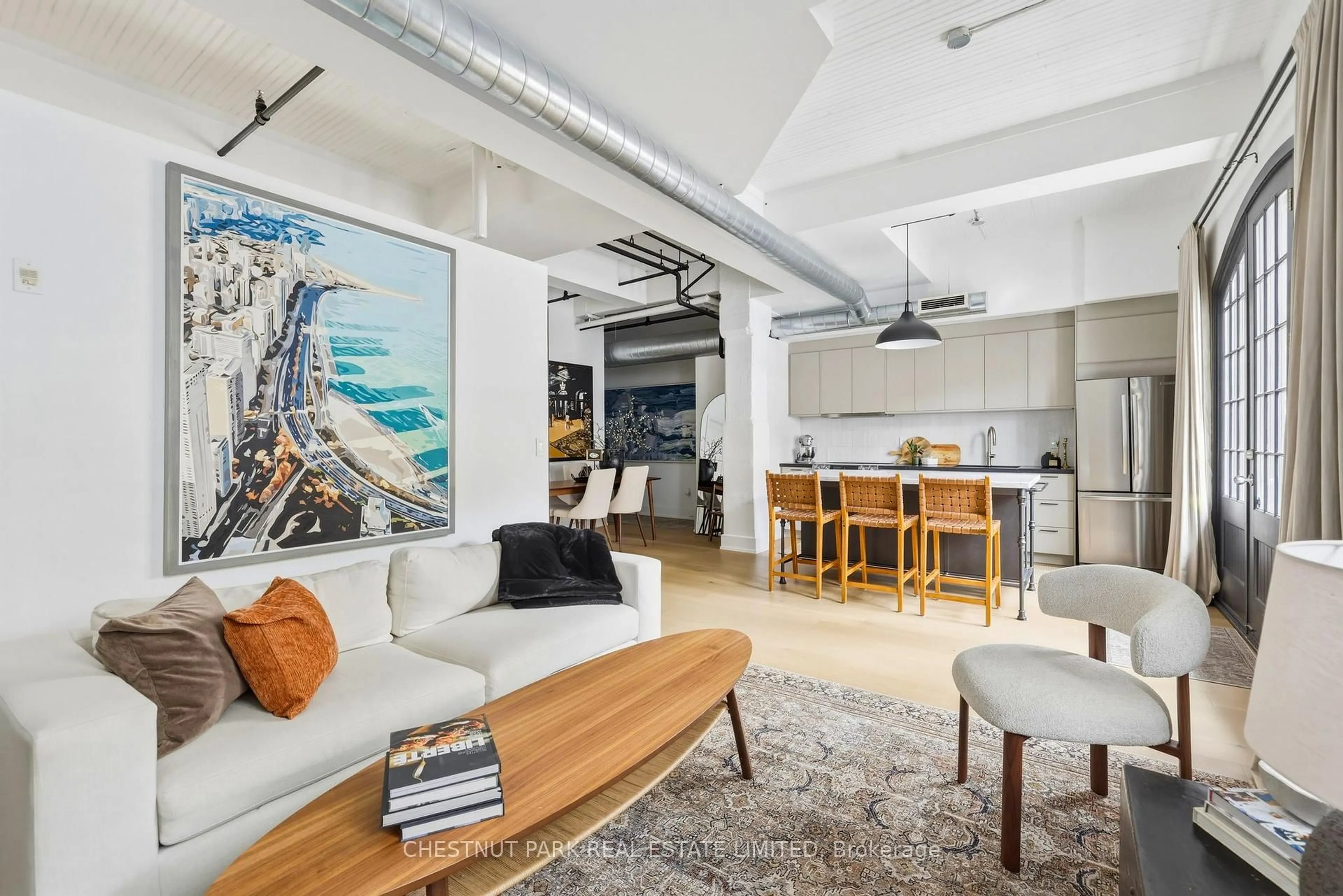 Living room with furniture, cement floor for 183 Dovercourt Rd #107, Toronto Ontario M6J 3C1