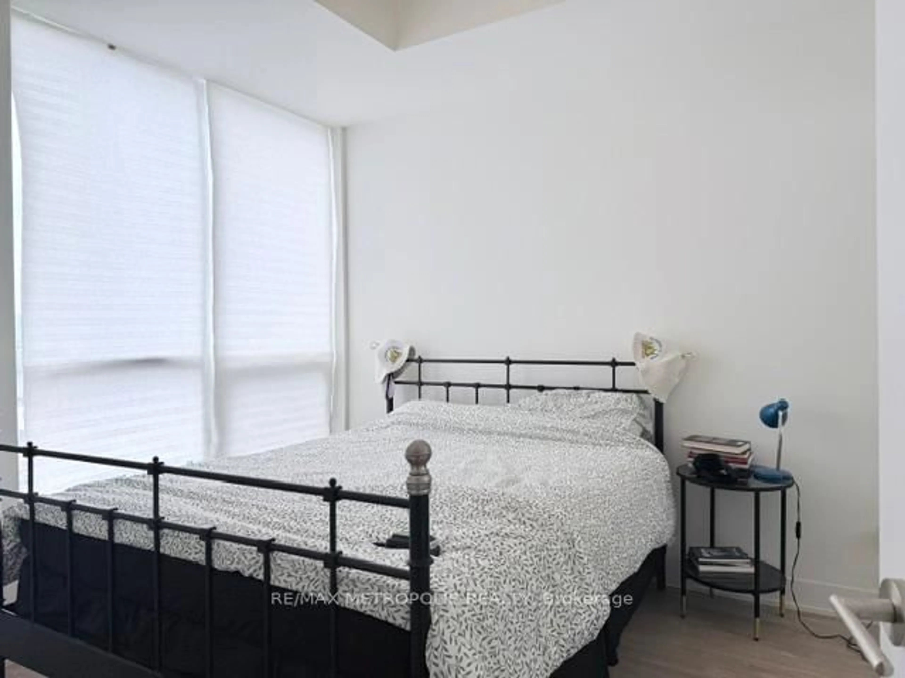 Bedroom with bed, floor is not visible for 38 Cameron St #1120, Toronto Ontario M5T 0C3