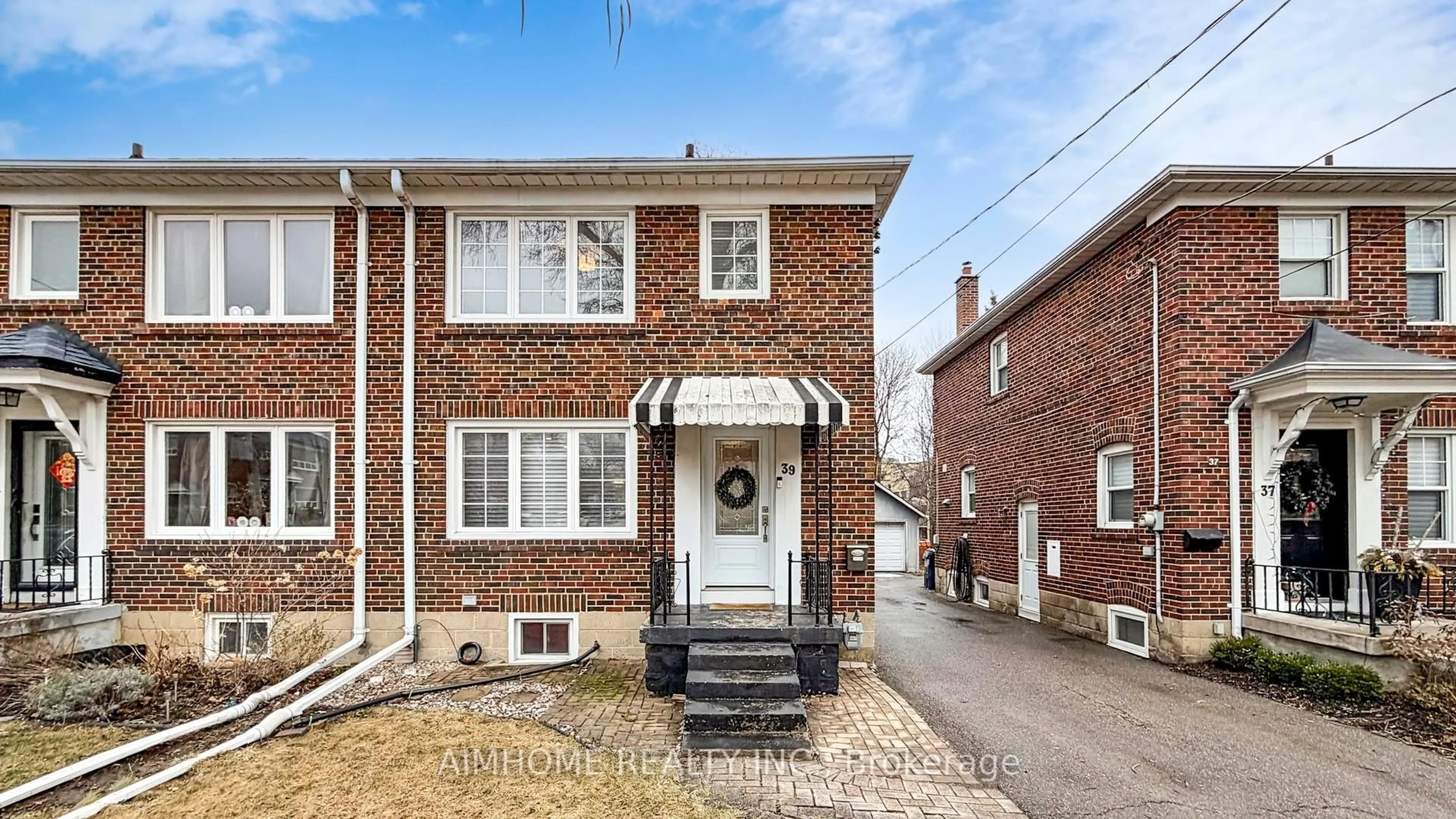 Home with brick exterior material, street for 39 Brentcliffe Rd, Toronto Ontario M4G 3Y4