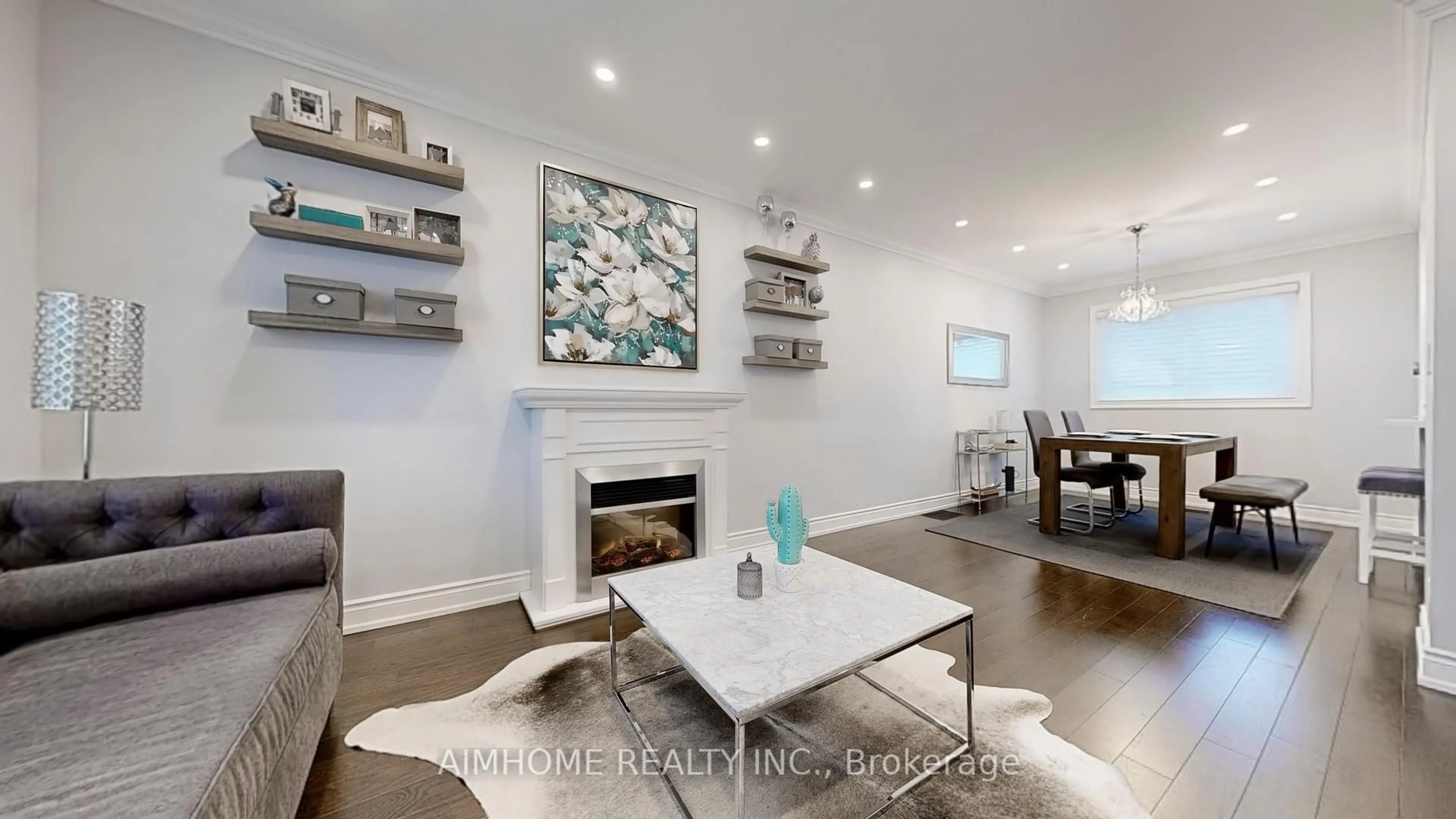 Living room with furniture, wood/laminate floor for 39 Brentcliffe Rd, Toronto Ontario M4G 3Y4