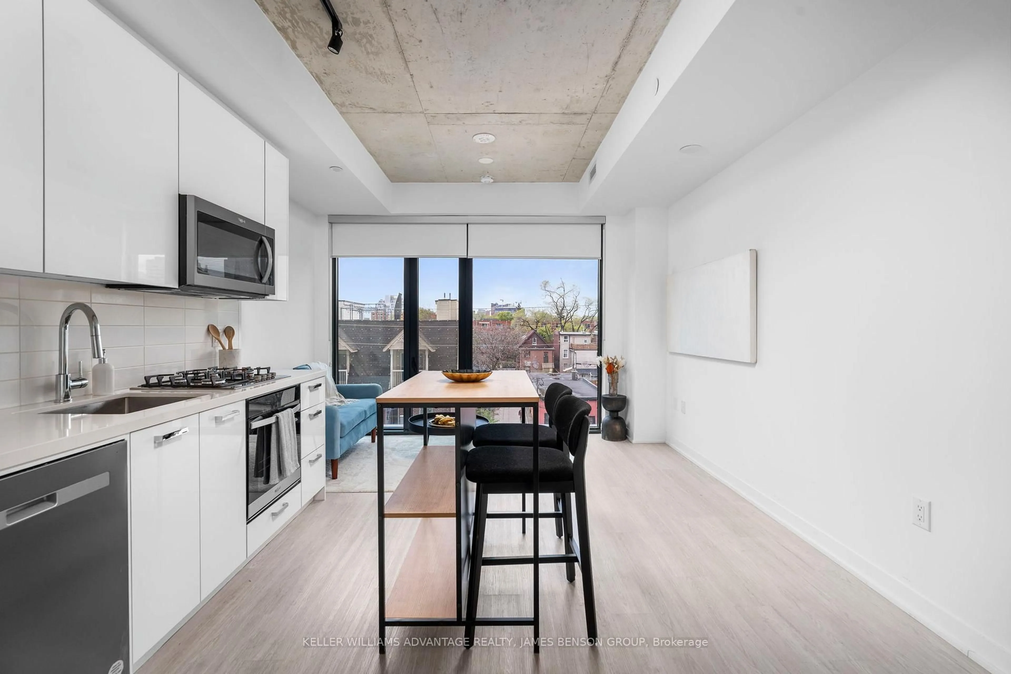 Open concept kitchen, cement floor for 195 McCaul St #301, Toronto Ontario M5T 1W6