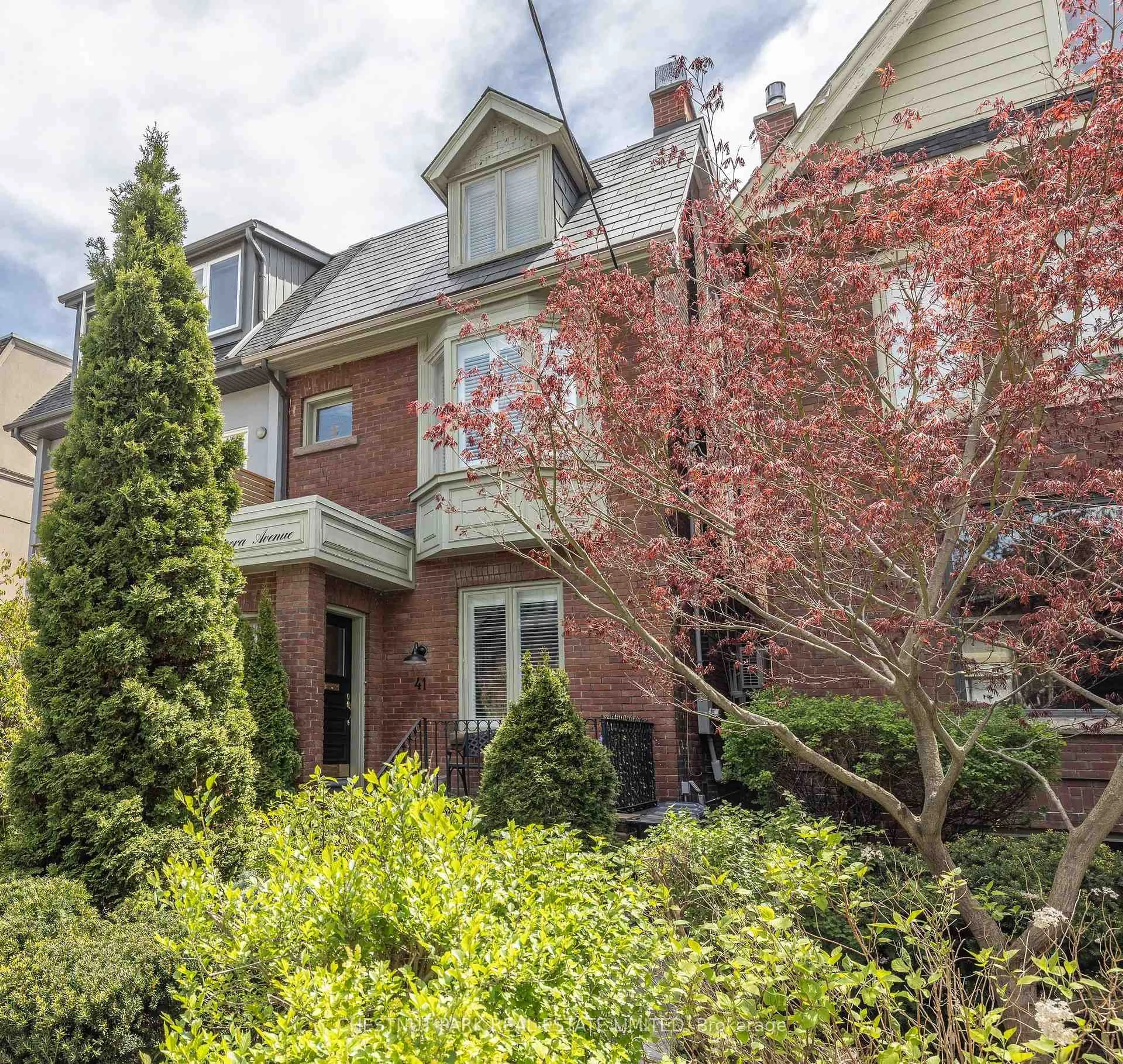 Home with brick exterior material, street for 41 Chicora Ave, Toronto Ontario M5R 1T7