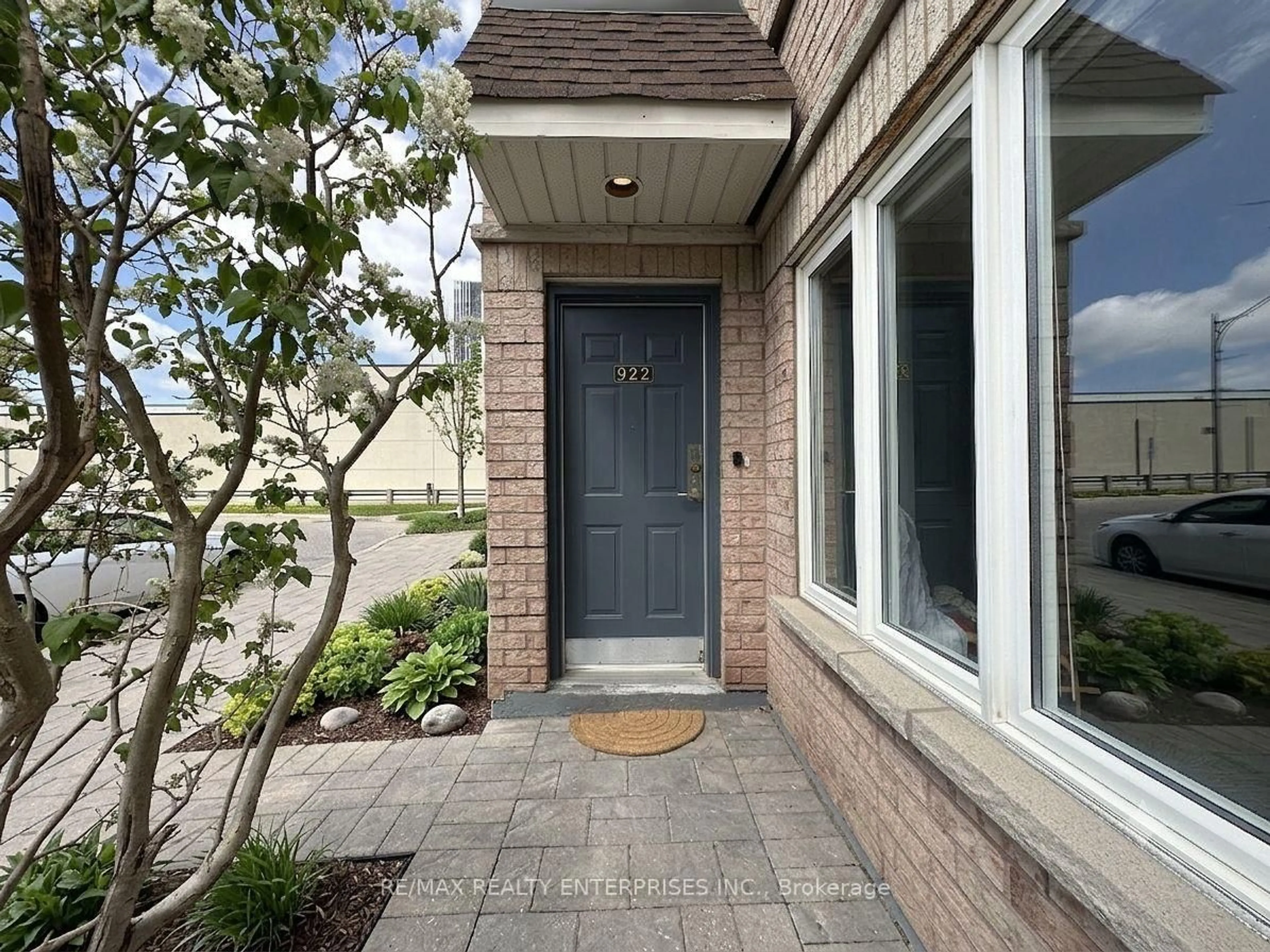 Home with brick exterior material, street for 52 Aerodrome Cres #102, Toronto Ontario M4G 4J1
