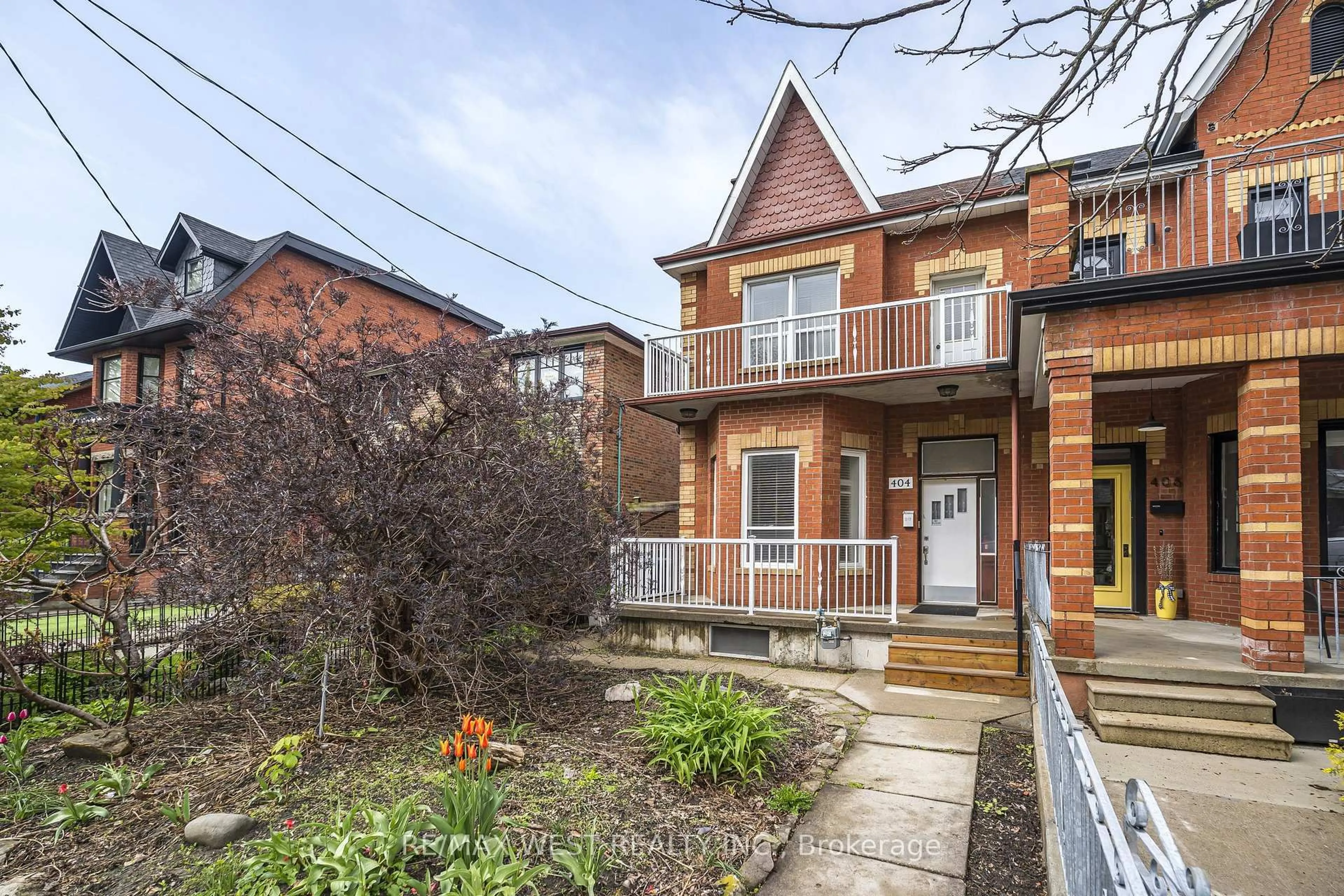 Home with brick exterior material, street for 404 Manning Ave, Toronto Ontario M6G 2V7