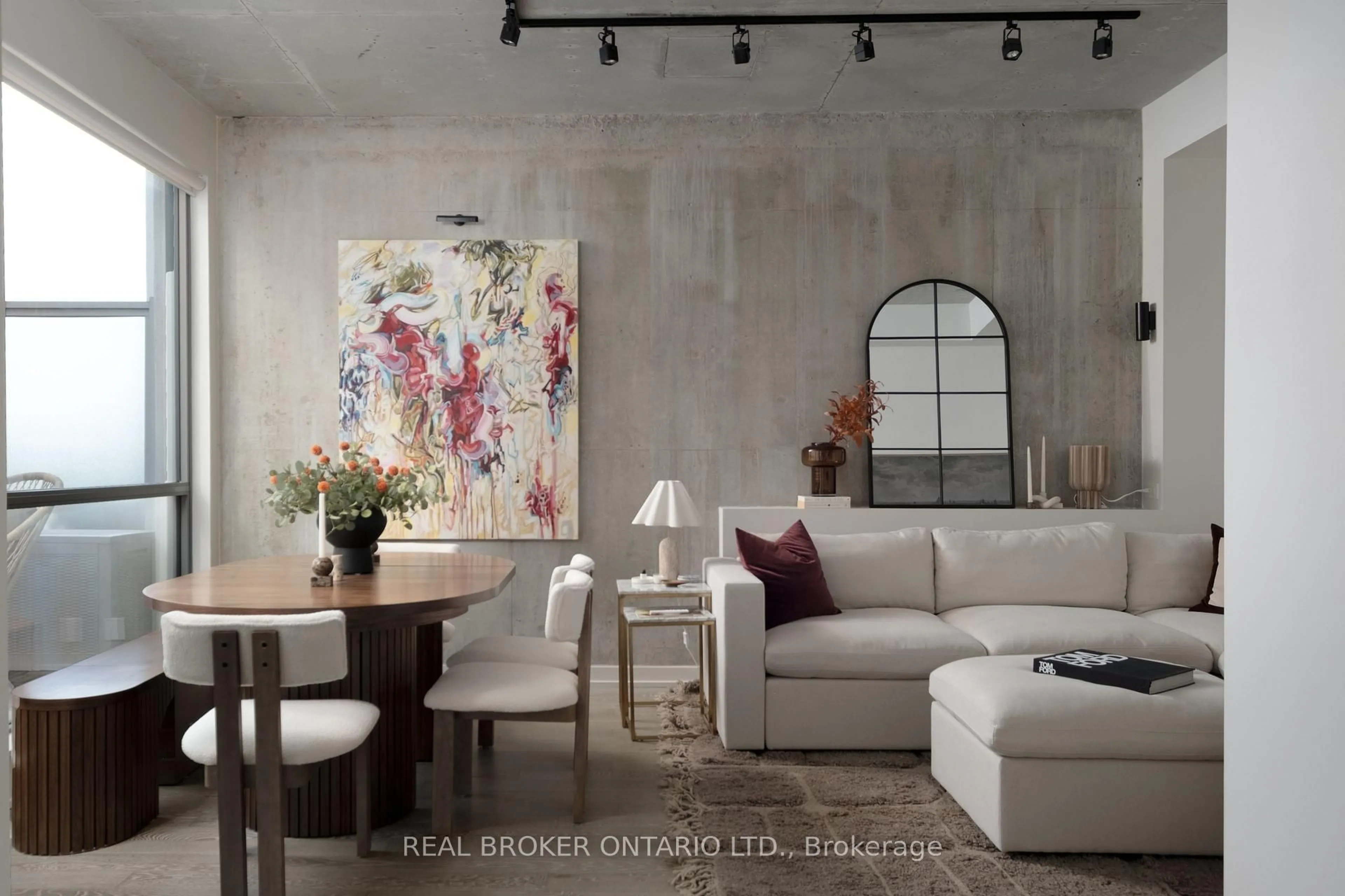 Living room with furniture, cement floor for 39 Brant St #PH24, Toronto Ontario M5V 0M8