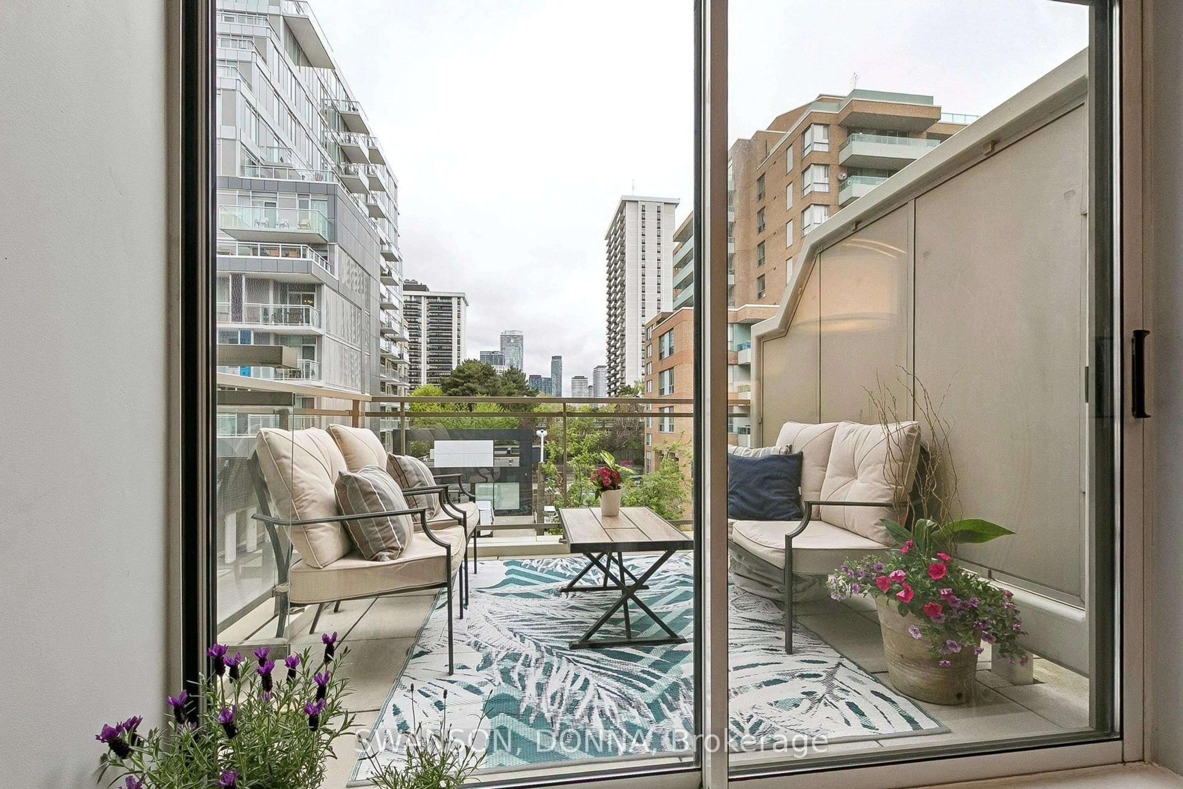 Patio, city buildings view from balcony for 111 Merton St #303, Toronto Ontario M4S 3A7