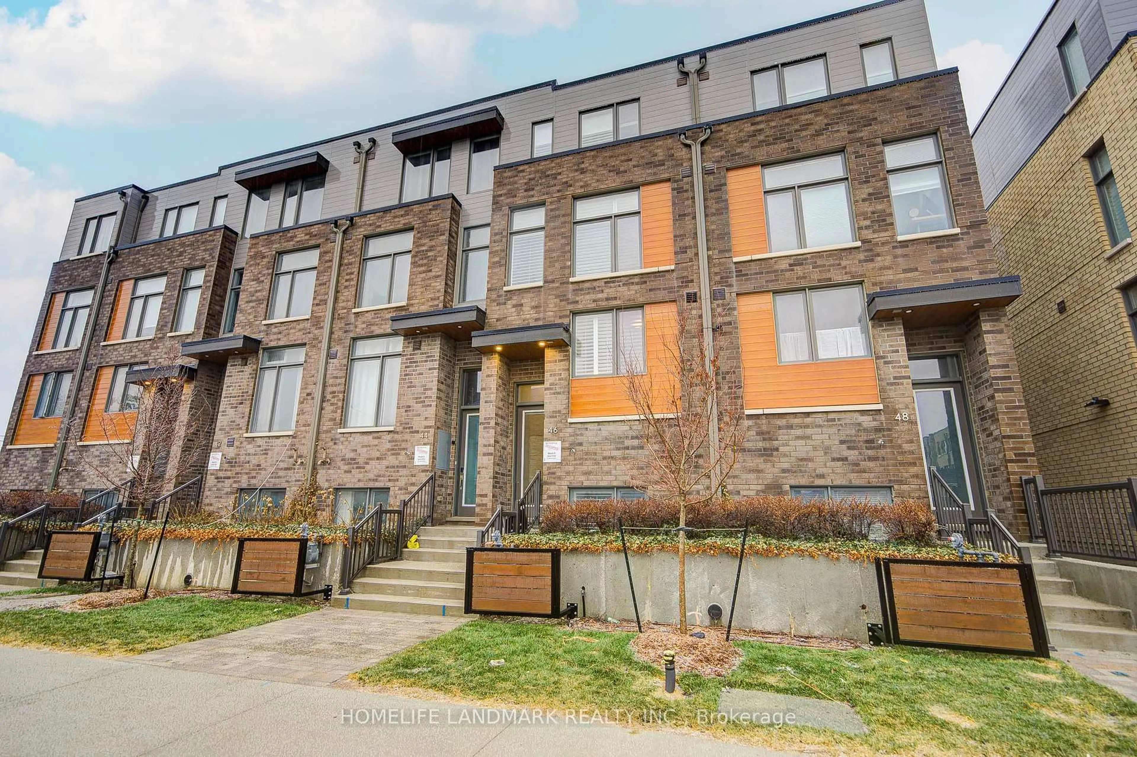 Home with brick exterior material, street for 46 Hooyo Terr, Toronto Ontario M6A 0E2