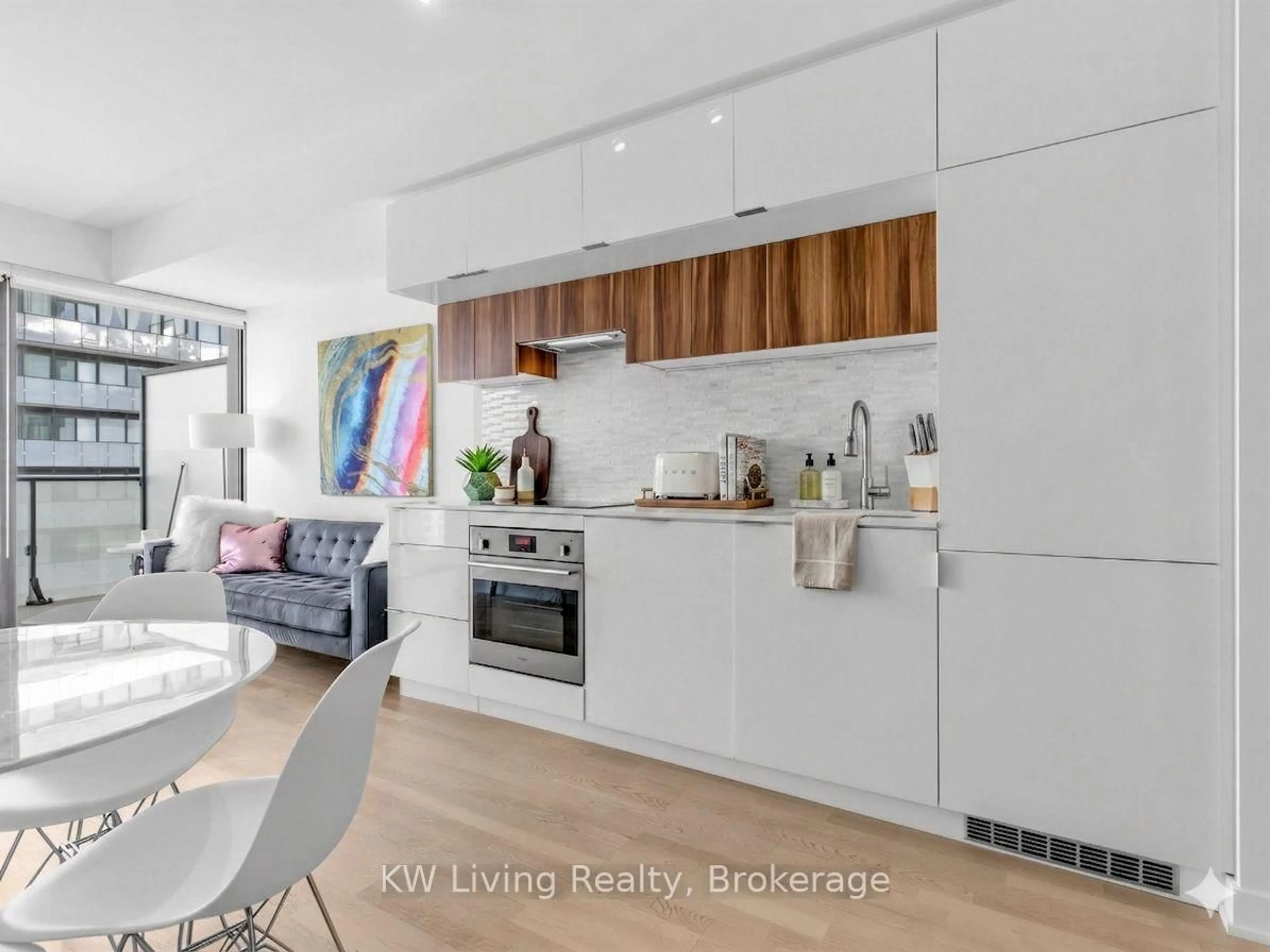 Open concept kitchen, wood/laminate floor for 185 Roehampton Ave #2312, Toronto Ontario M4P 0C6