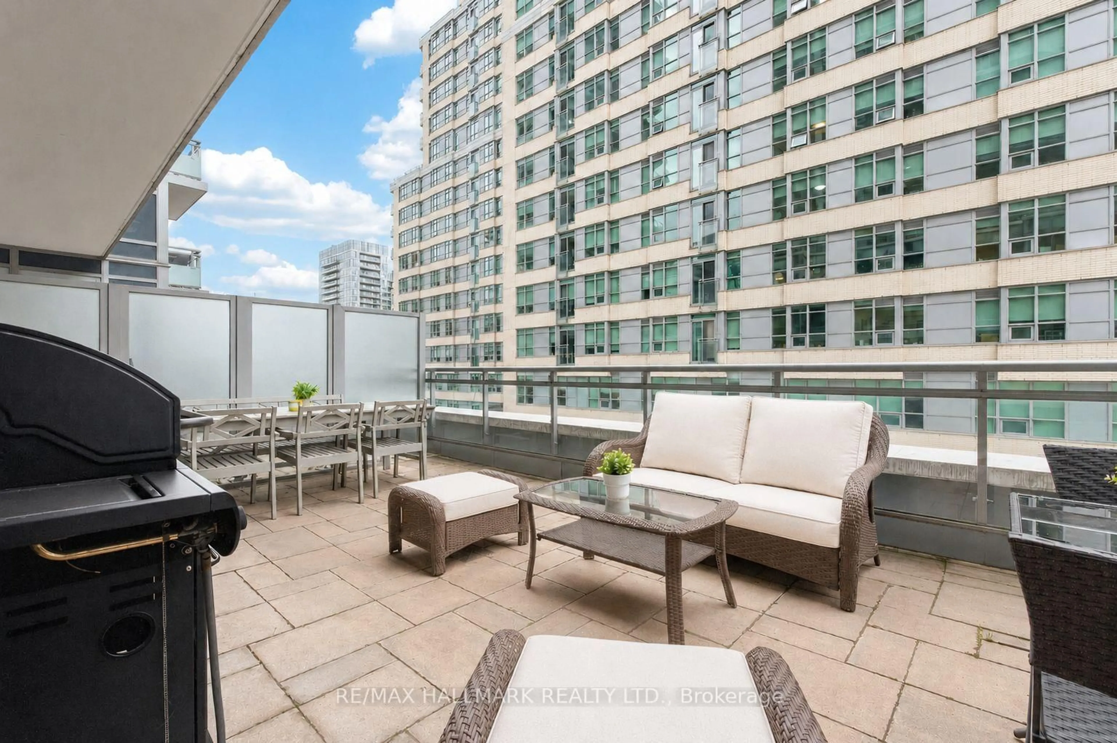 Patio, city buildings view from balcony for 89 Dunfield Ave #408, Toronto Ontario M4S 0A4