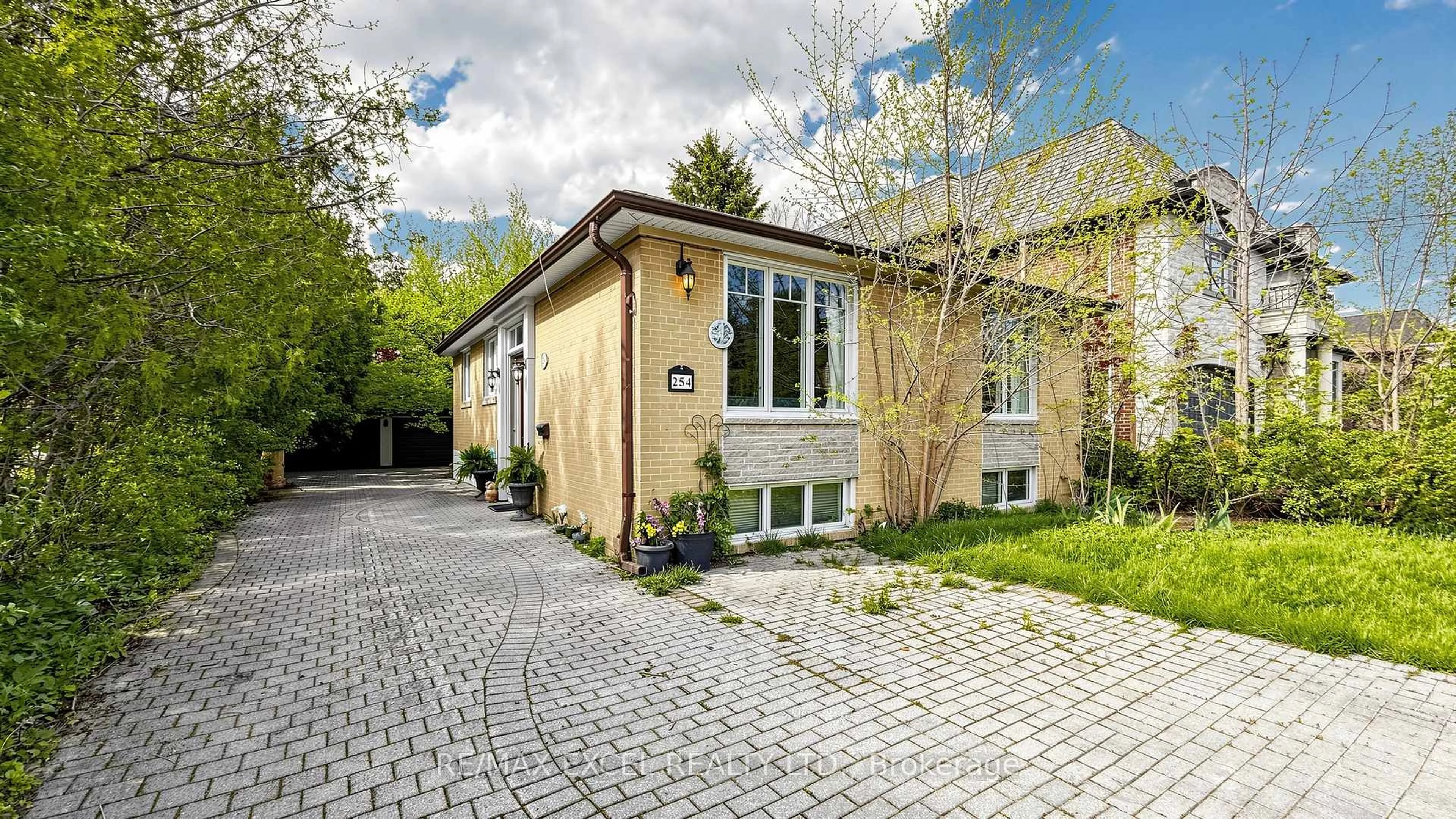 Home with brick exterior material, street for 254 Patricia Ave, Toronto Ontario M2M 1J8