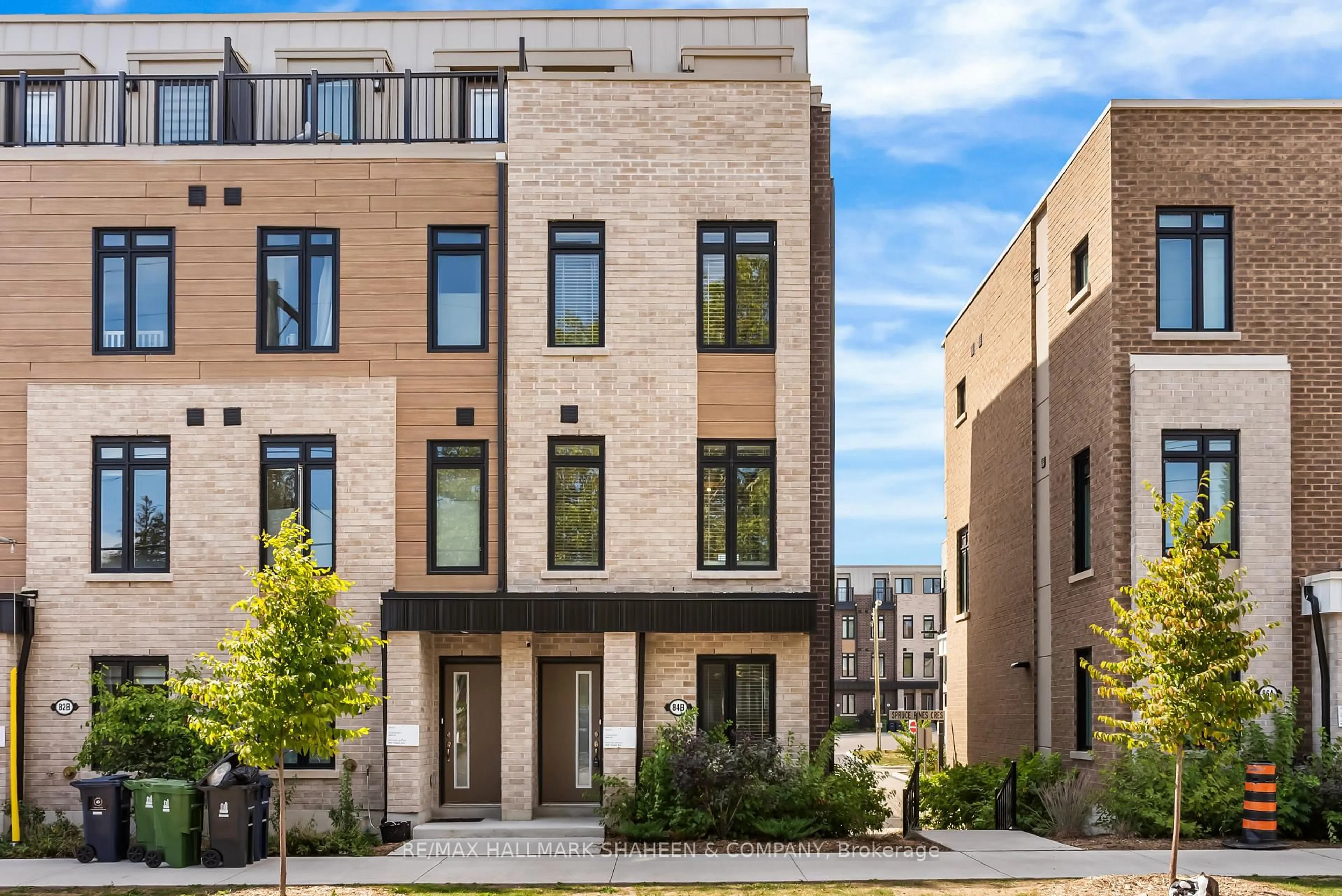 Home with brick exterior material, street for 84B Tisdale Ave, Toronto Ontario M4A 0A9
