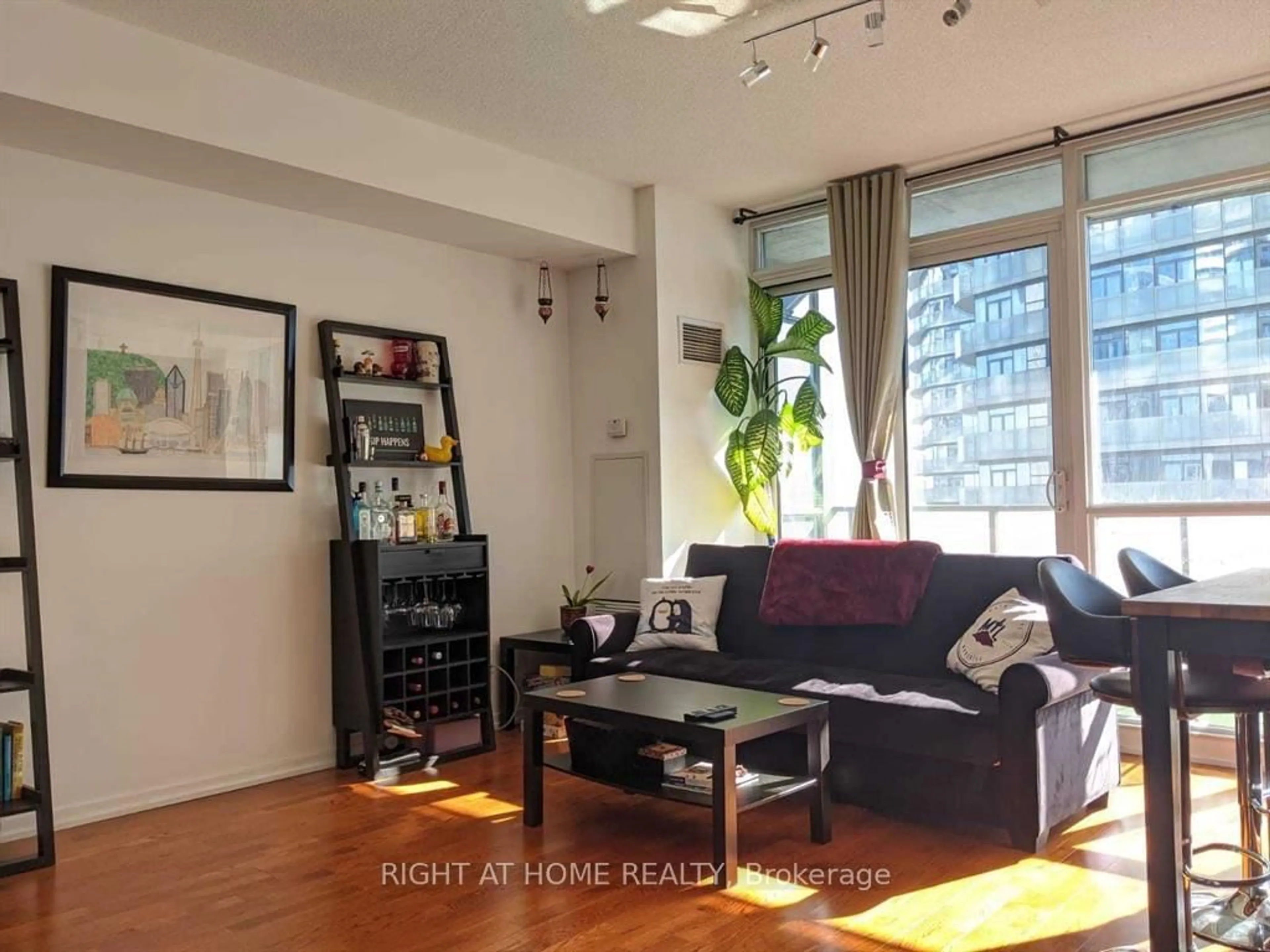 Living room with furniture, unknown for 55 Bremner Blvd #3411, Toronto Ontario M5J 0A6