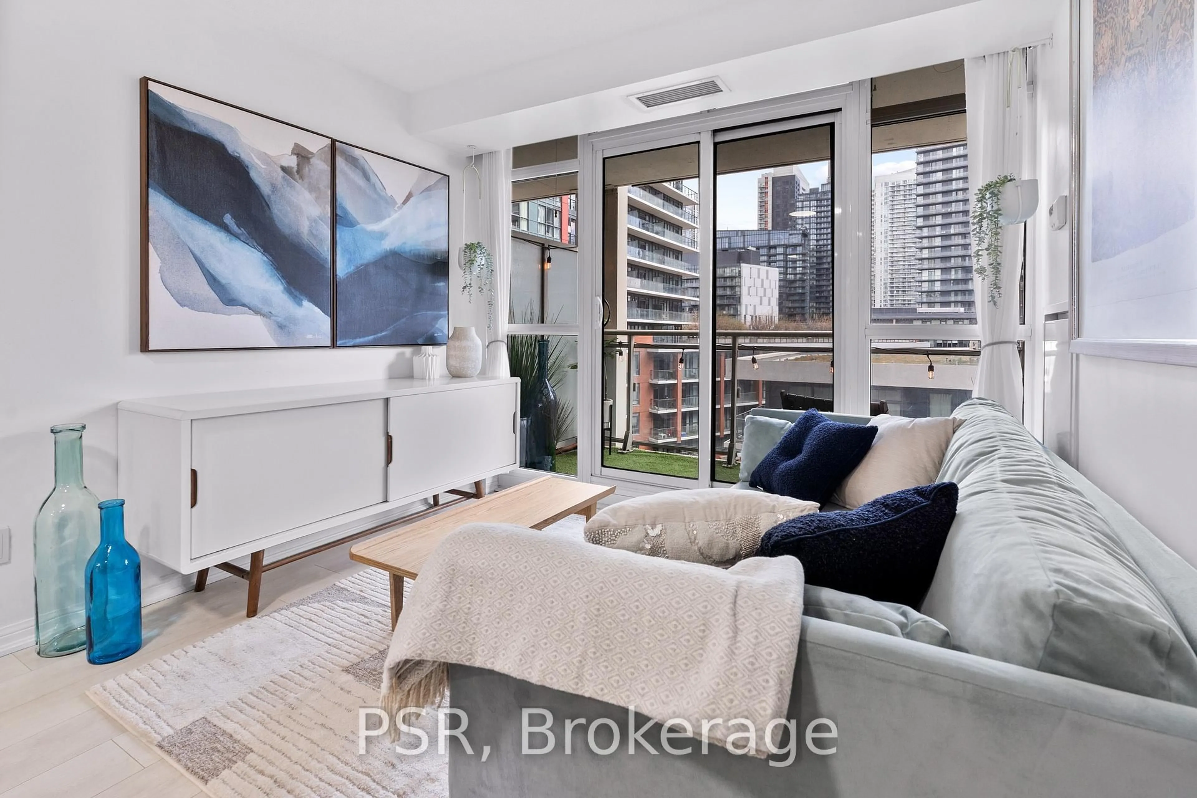 Living room with furniture, unknown for 38 Grand Magazine St #1031, Toronto Ontario M5V 0B1